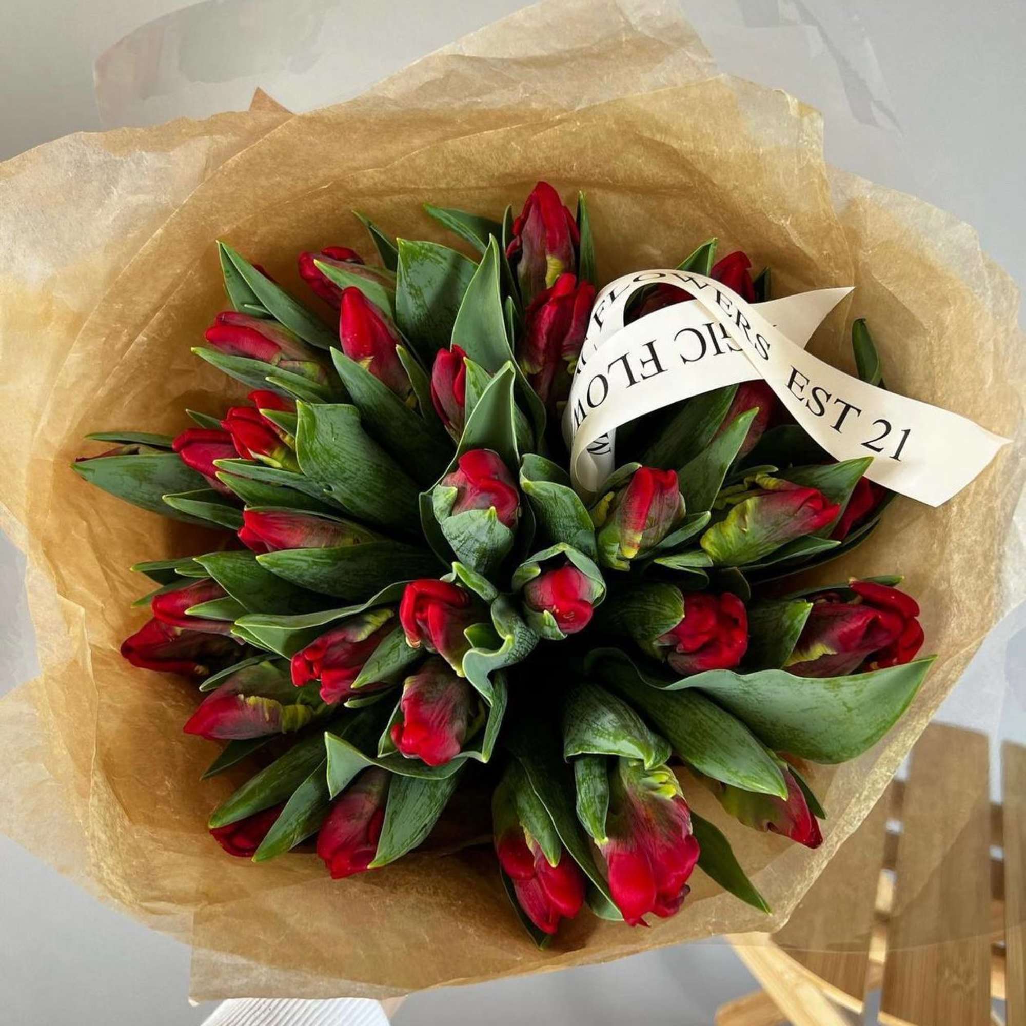 A bouquet of red tulips is a passionate and elegant composition expressing