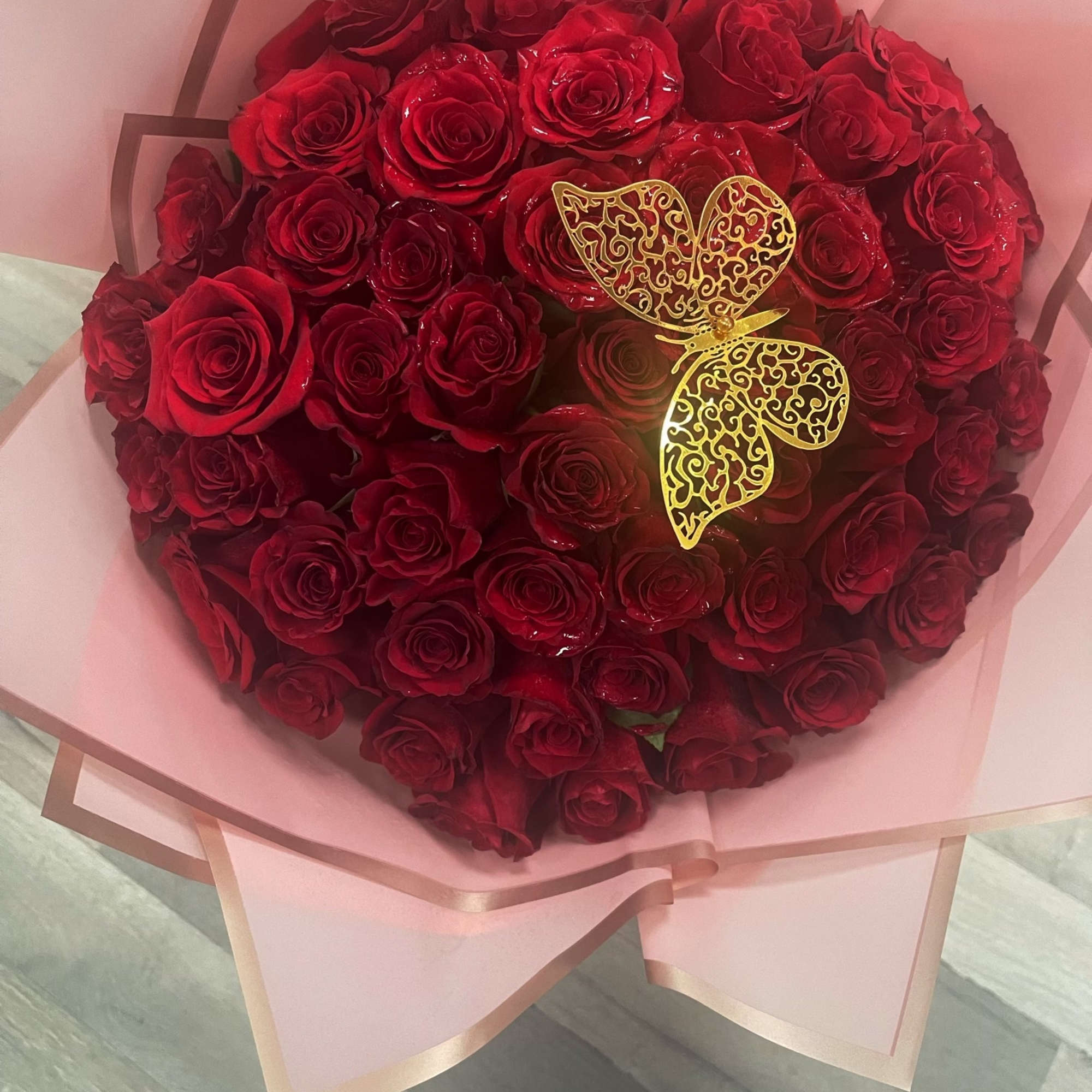 beautiful fresh Premium red roses hand tied bouquet, the stems are wrapped beautiful fresh Premium red roses hand tied bouquet, the stems are wrapped