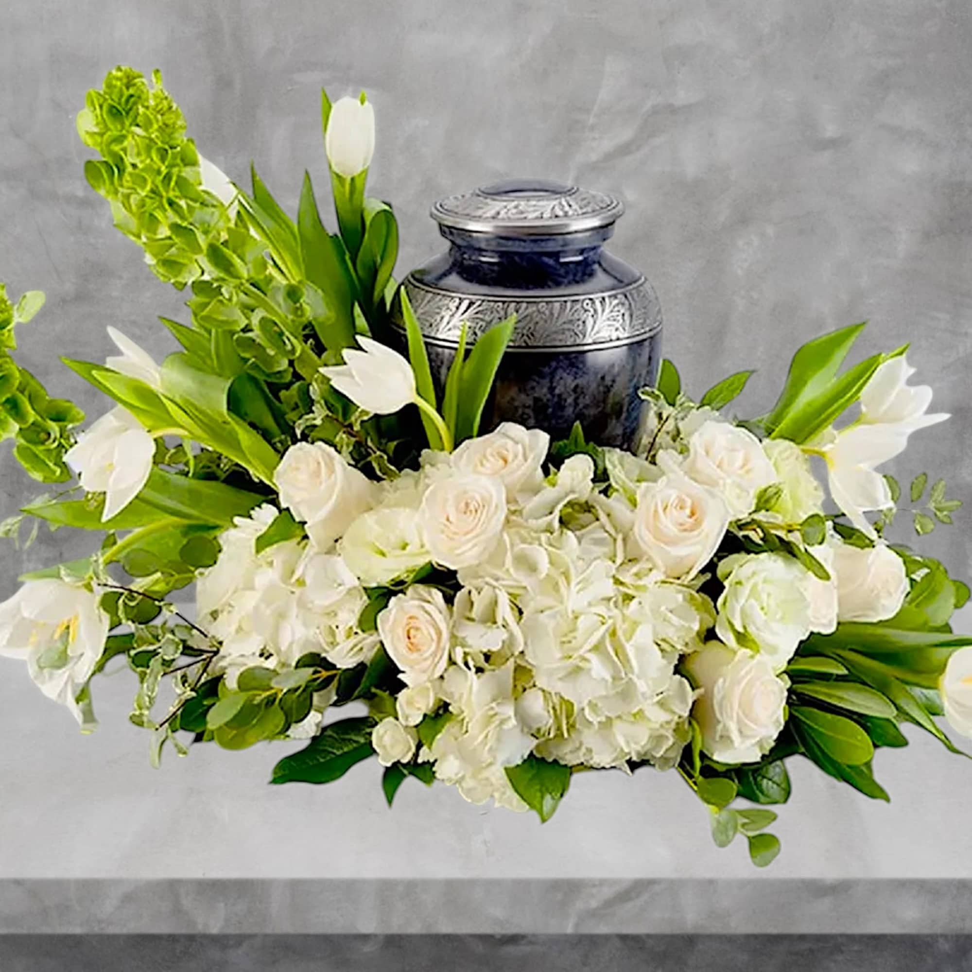 An all-white tribute, this all-white funeral urn is pure and tranquil. Featuring