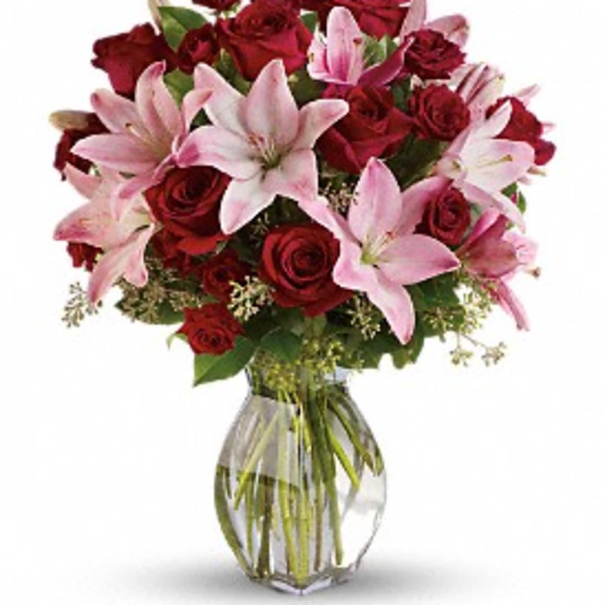 Lovely reds and pinks come together in this lavishly romantic anniversary gift. Lovely reds and pinks come together in this lavishly romantic anniversary gift.
