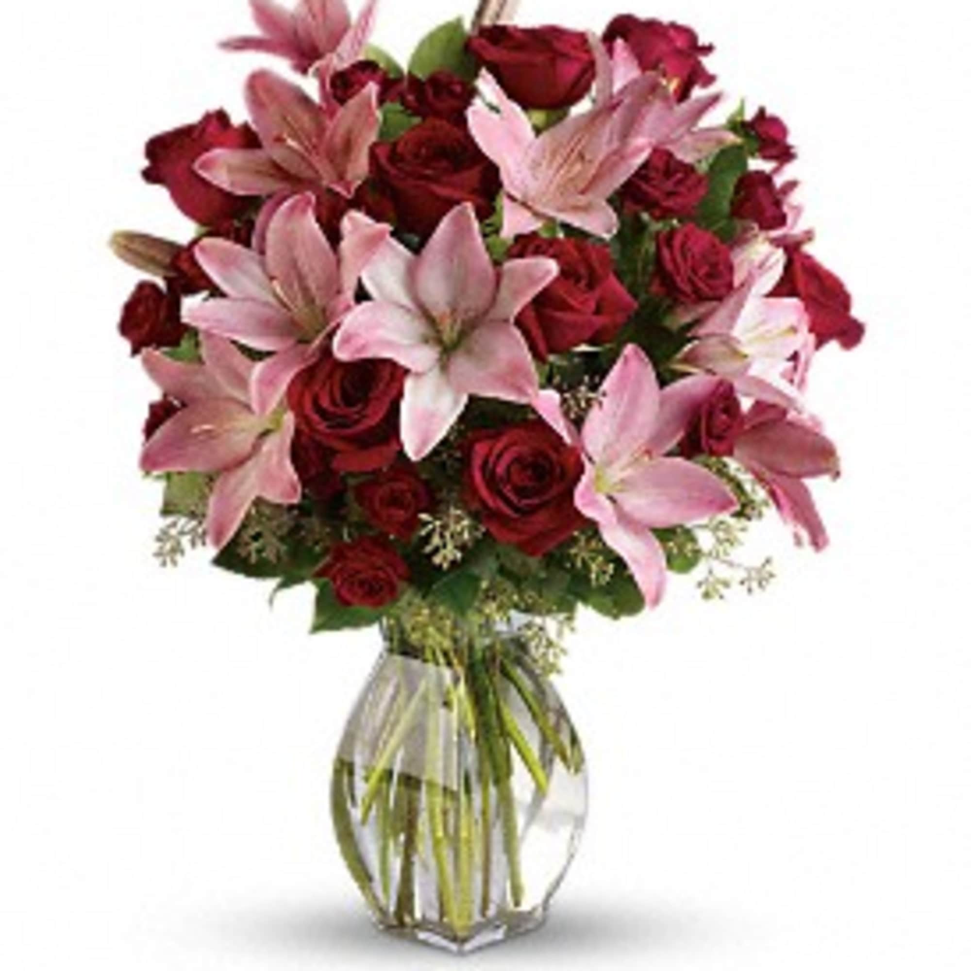 Lovely reds and pinks come together in this lavishly romantic anniversary gift. Lovely reds and pinks come together in this lavishly romantic anniversary gift.
