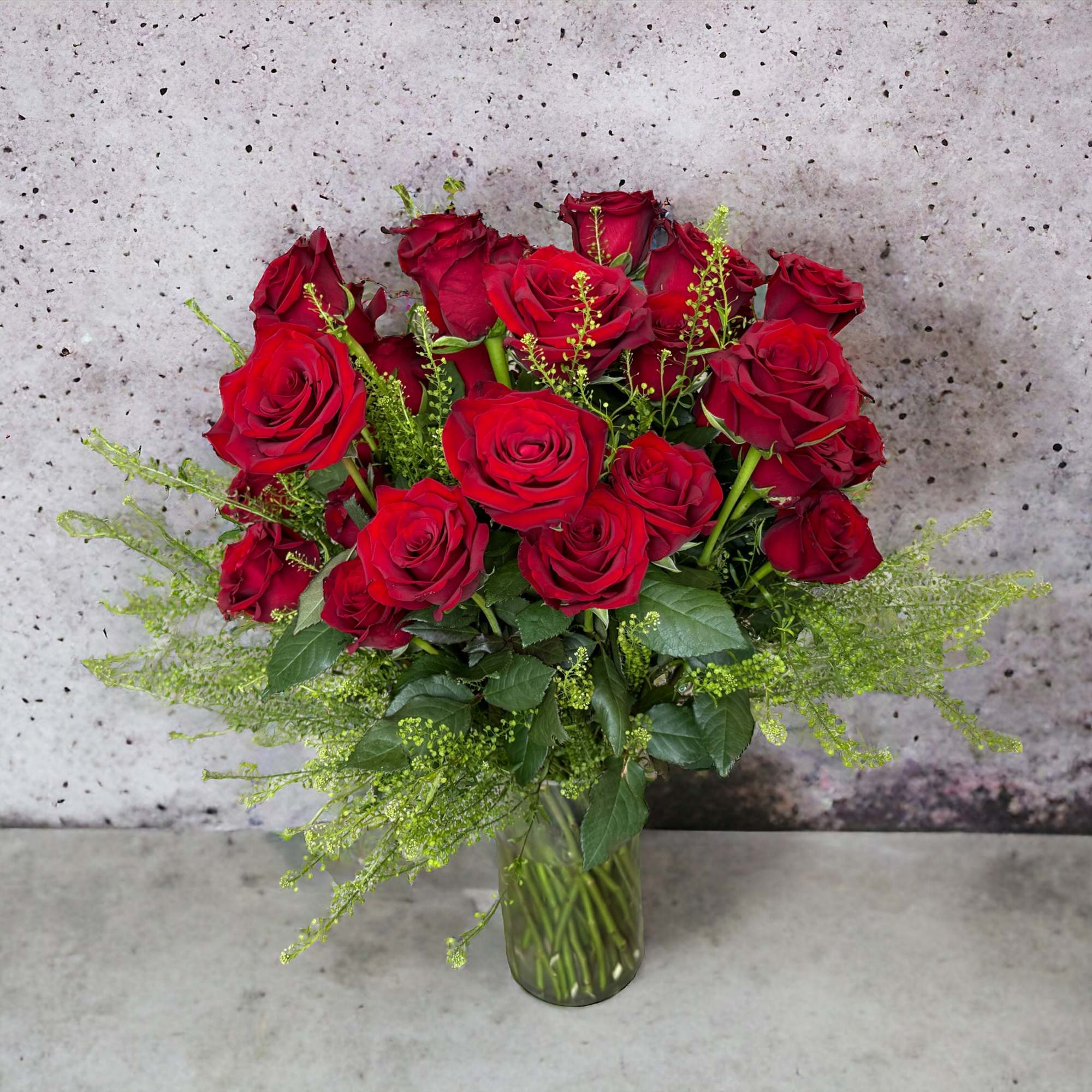 These two dozen red roses provide the classic romantic gift. It's perfect These two dozen red roses provide the classic romantic gift. It's perfect