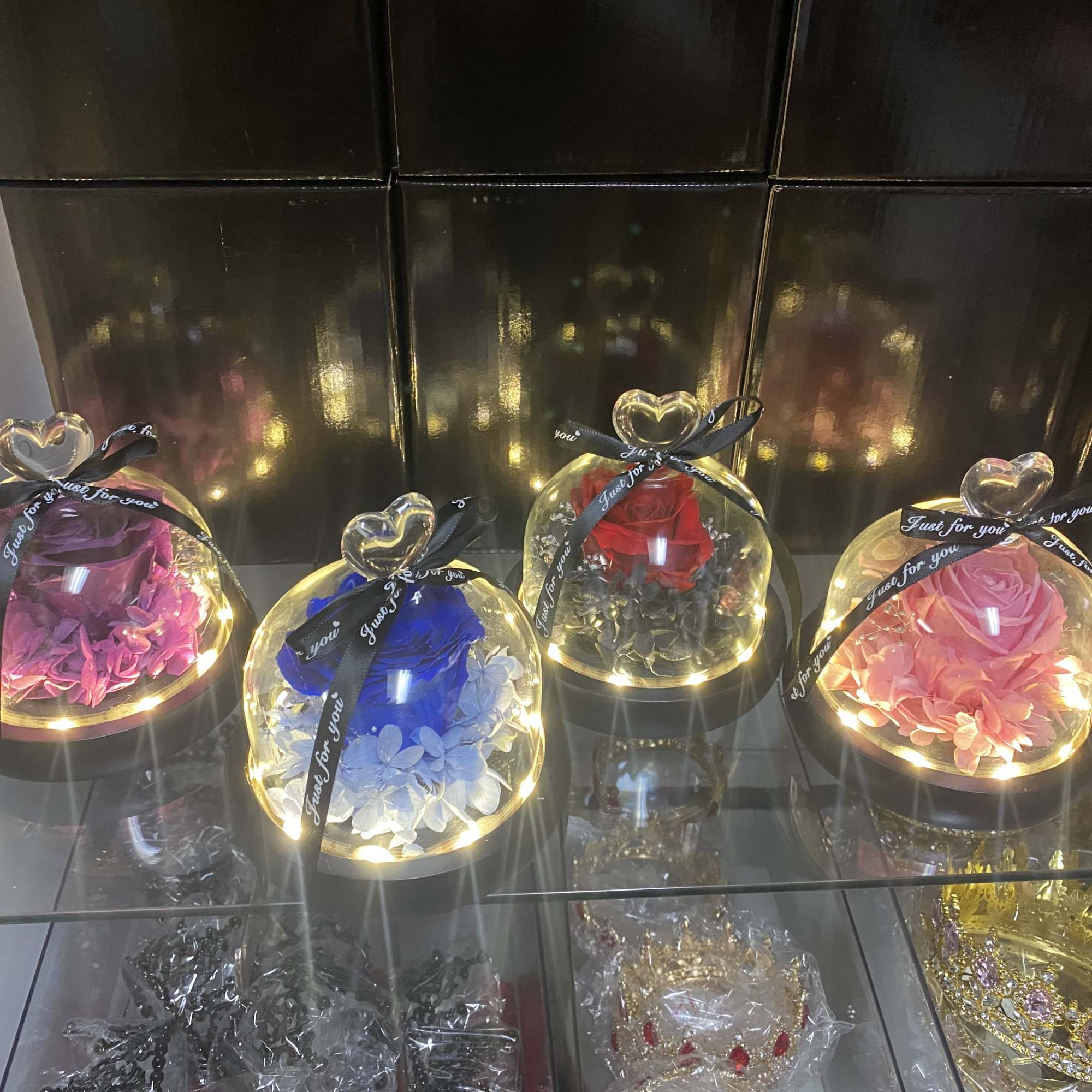 These gorgeous rose domes are made out of real preserved roses. They