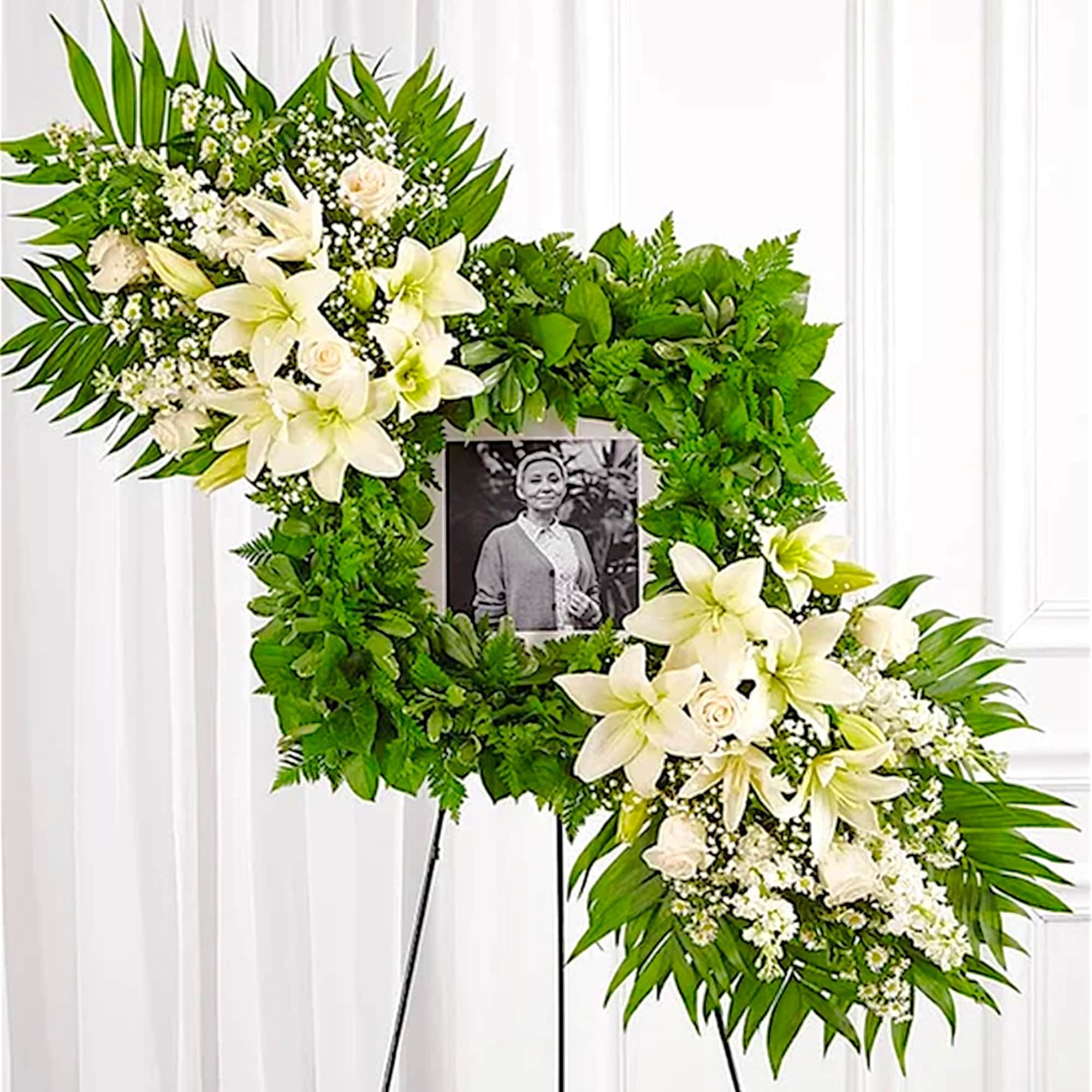 Celebrate the cherished memories you shared with a beautiful floral arrangement. The