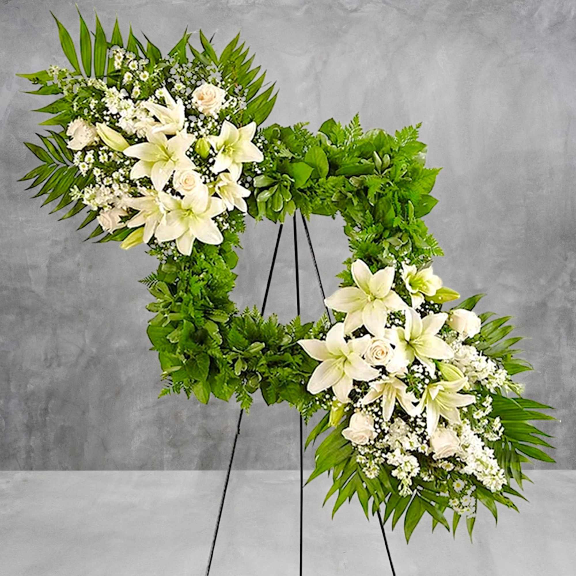 Celebrate the cherished memories you shared with a beautiful floral arrangement. The