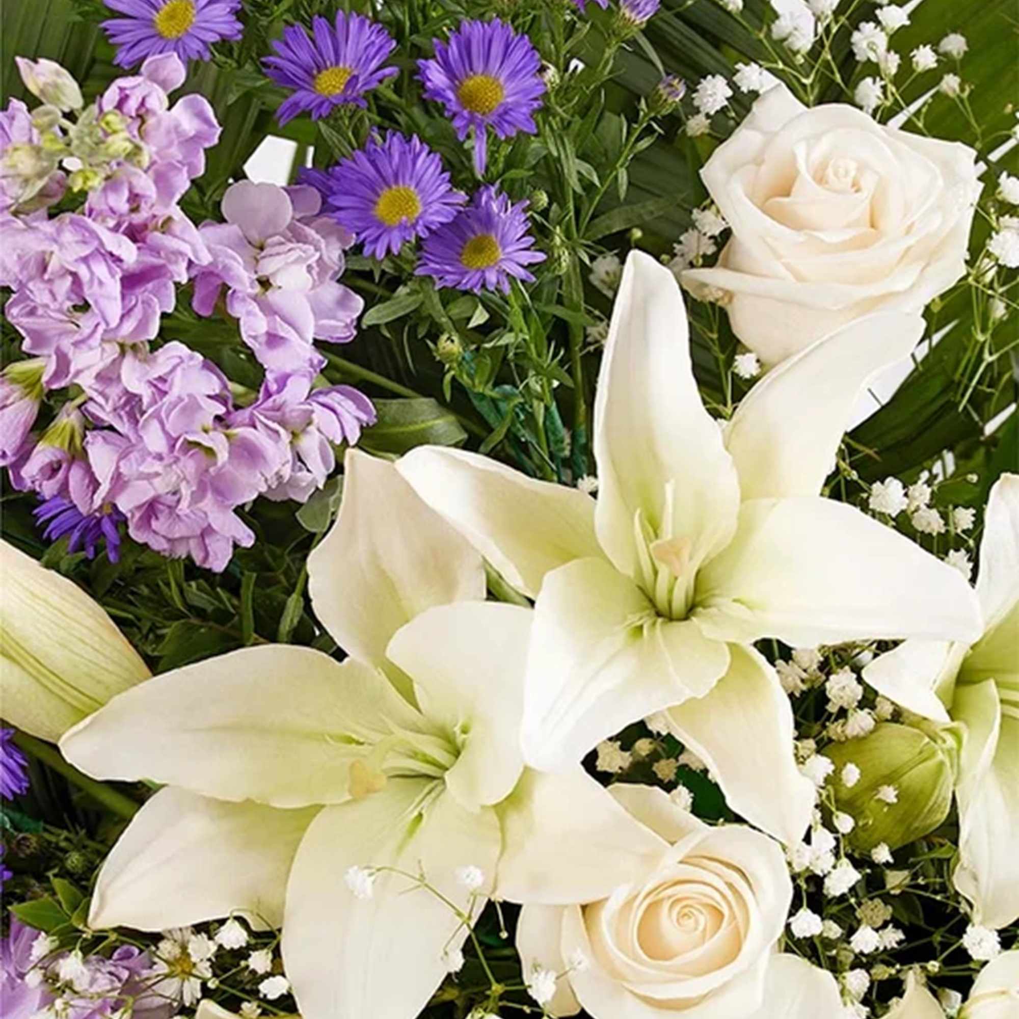 Celebrate the cherished memories you shared with a beautiful floral arrangement. Our