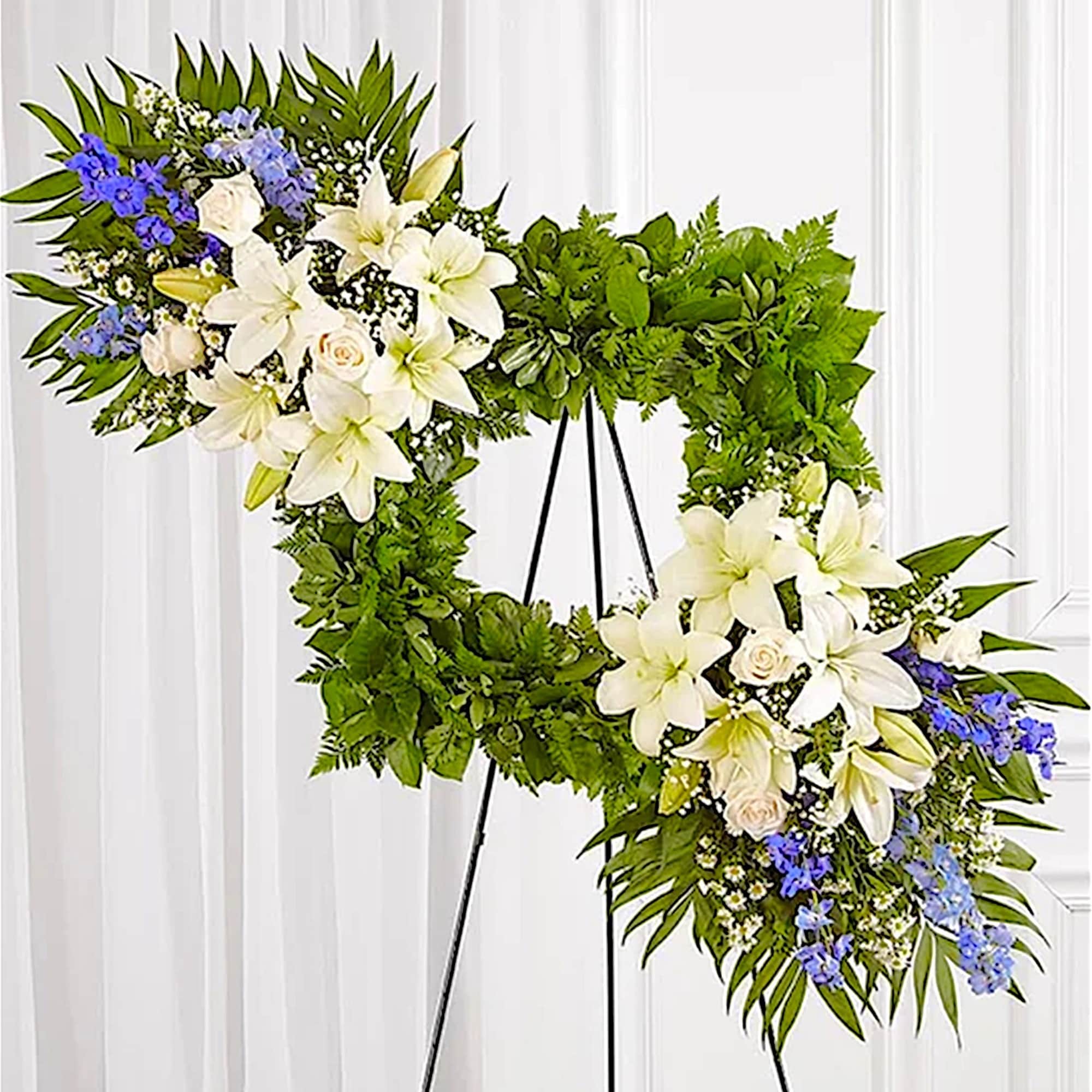Celebrate the cherished memories you shared with a beautiful floral arrangement. The
