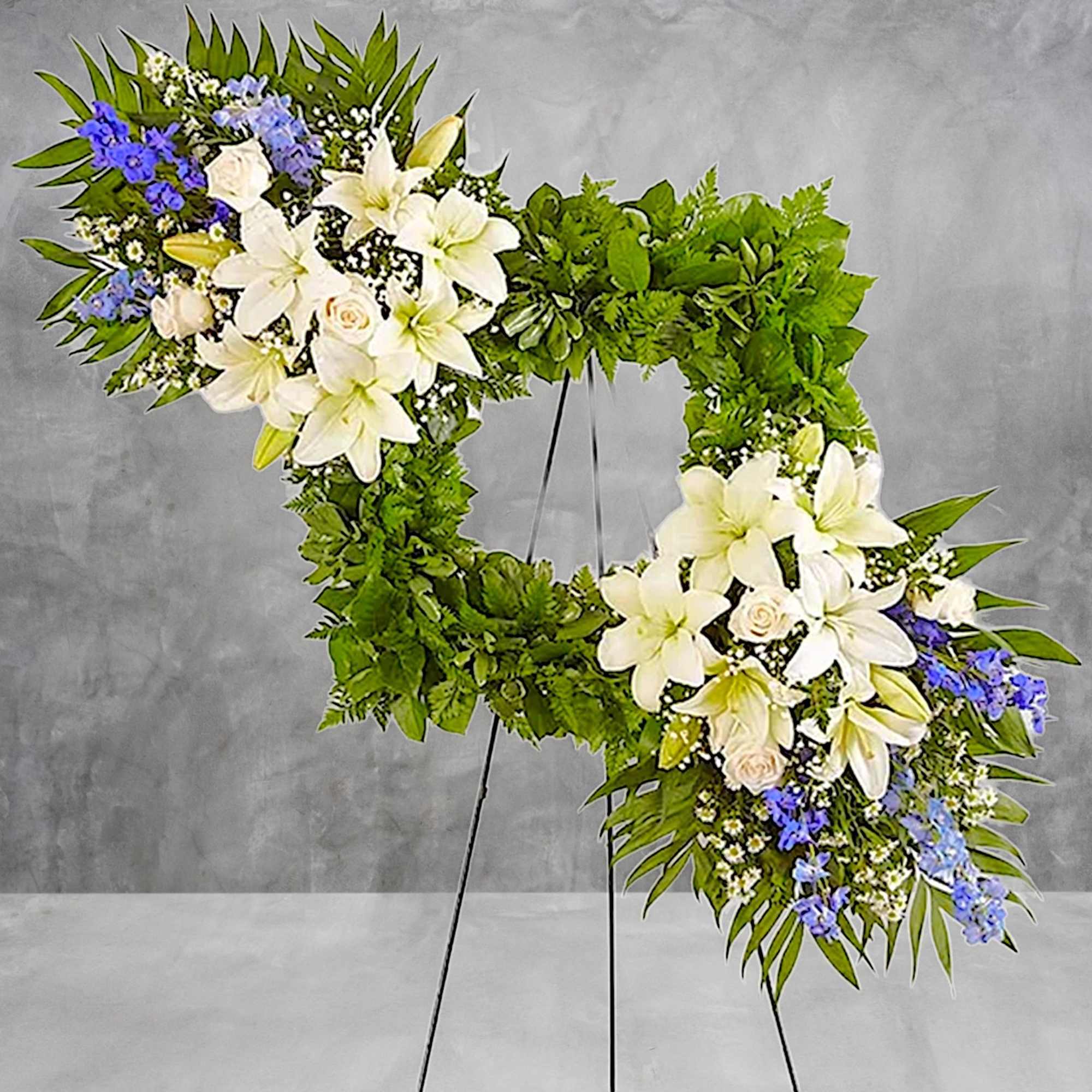 Celebrate the cherished memories you shared with a beautiful floral arrangement. The