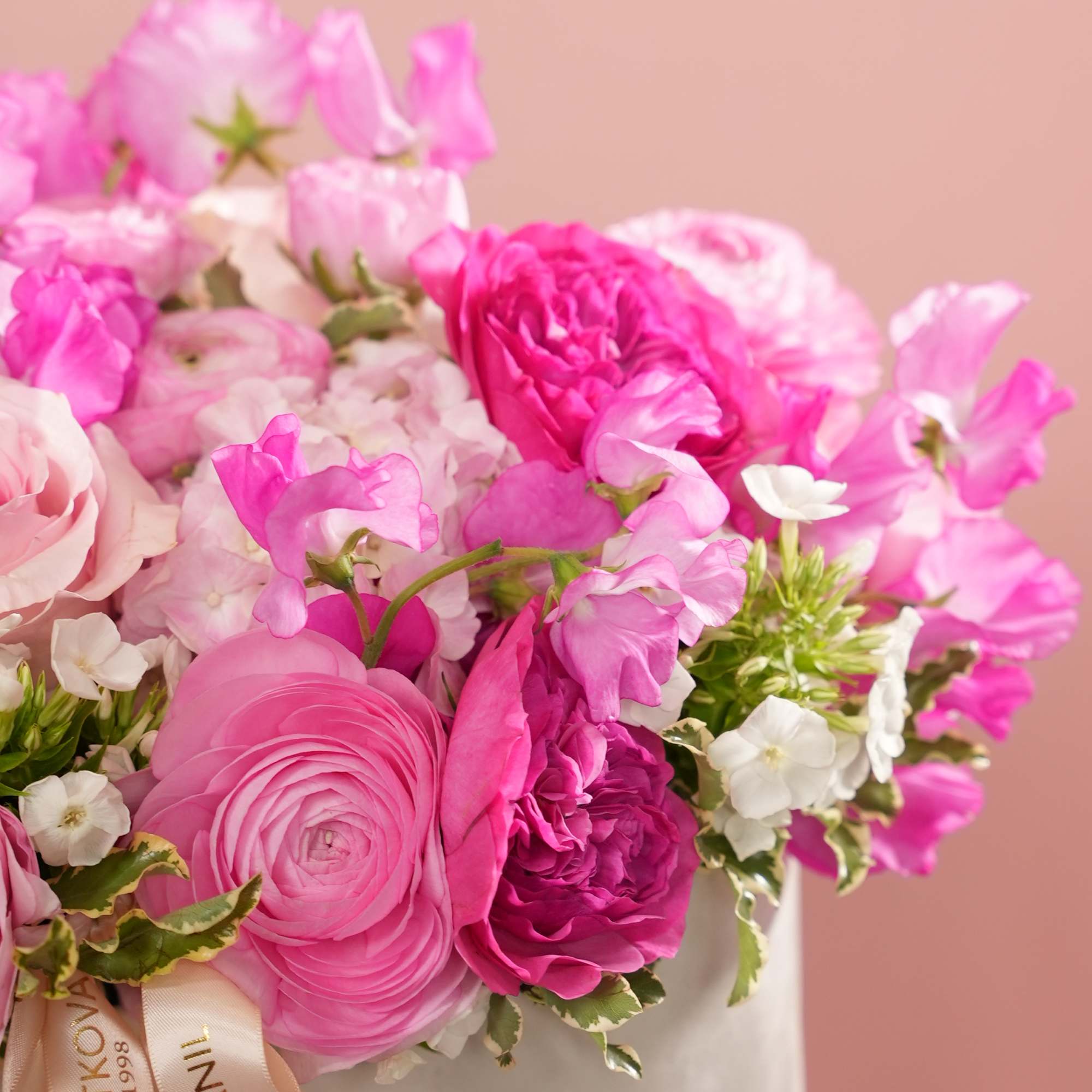Indulge your mother with our &quot;Raspberry Blush&quot; bouquet, an exquisite arrangement crafted