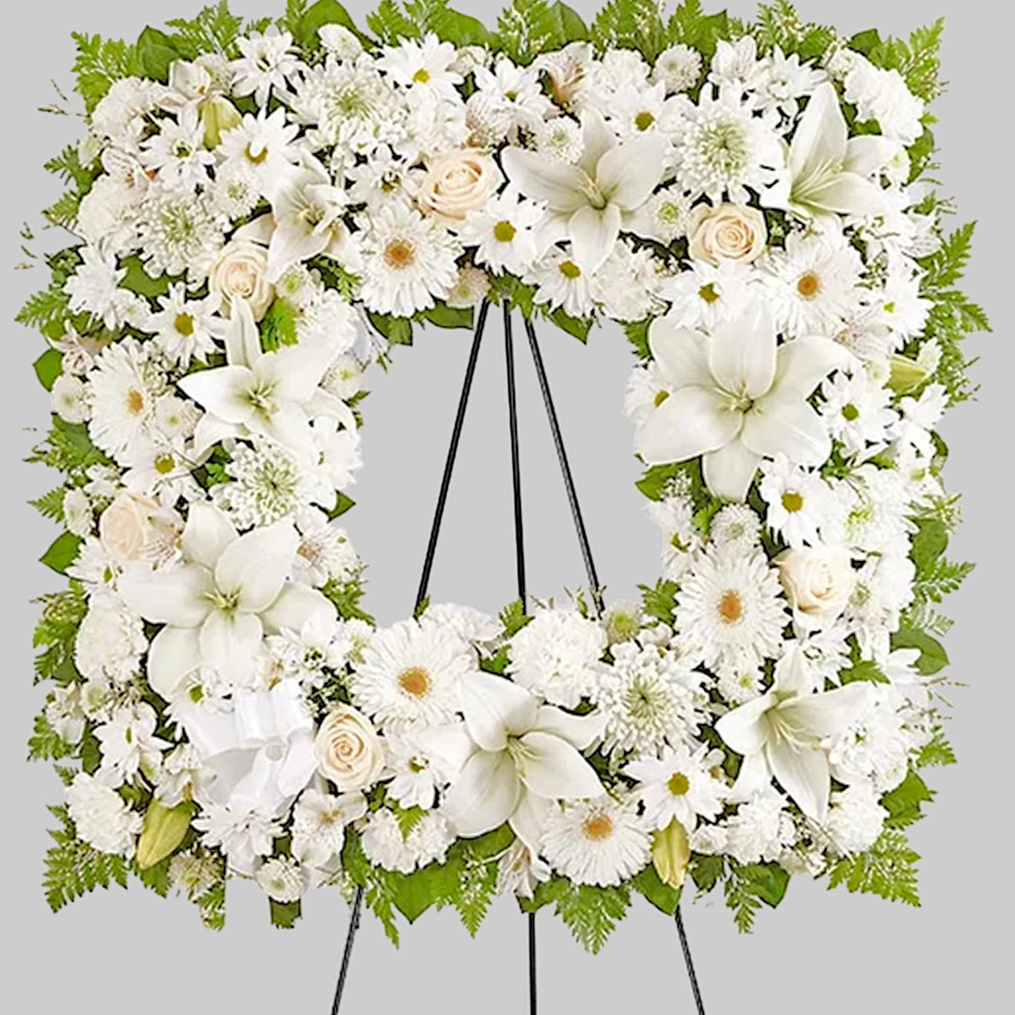 Offer solace with a sentimental arrangement for the services. The square wreath
