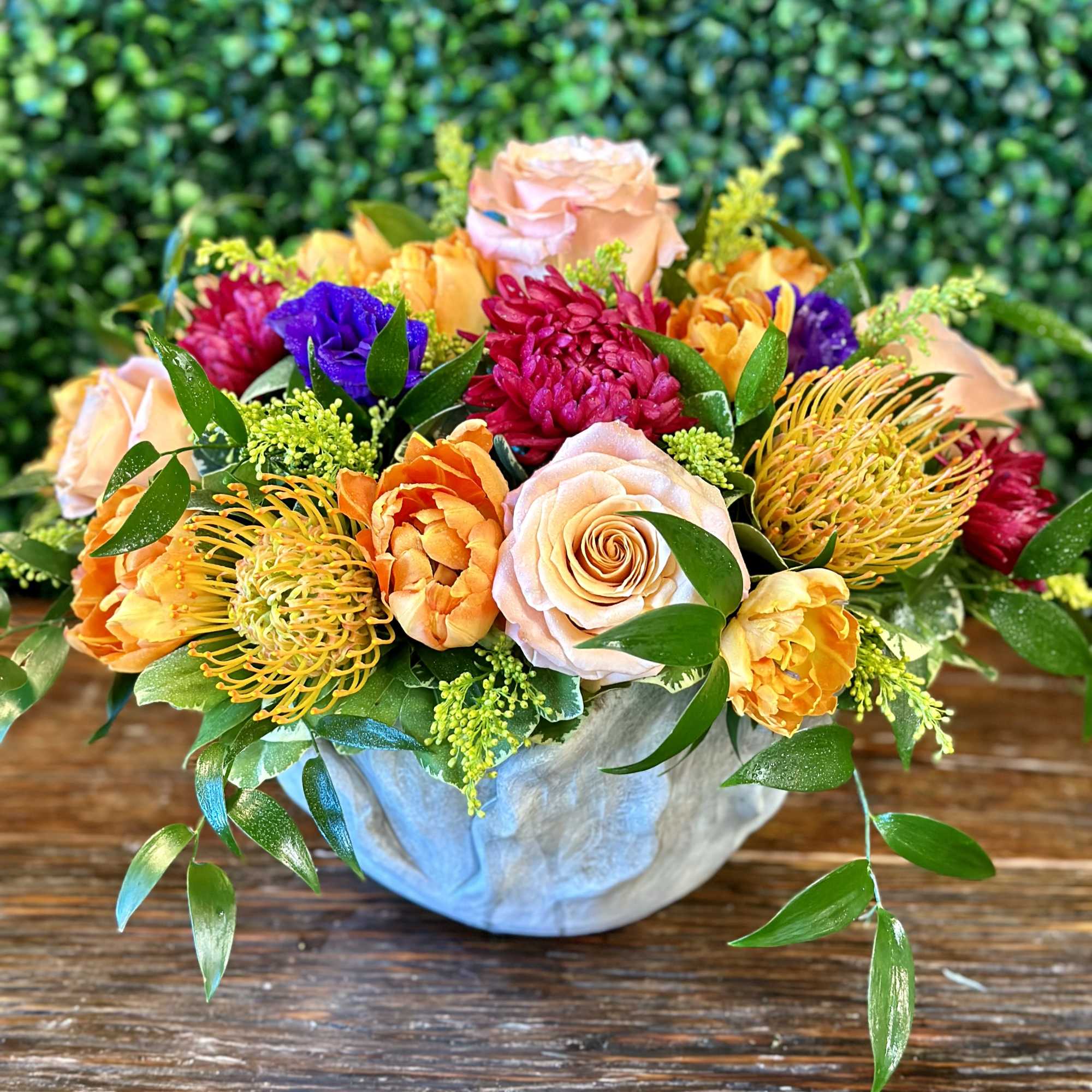 Enjoy Protea, Aster, Roses, Tulips and more in this Concrete Planter Bowl.