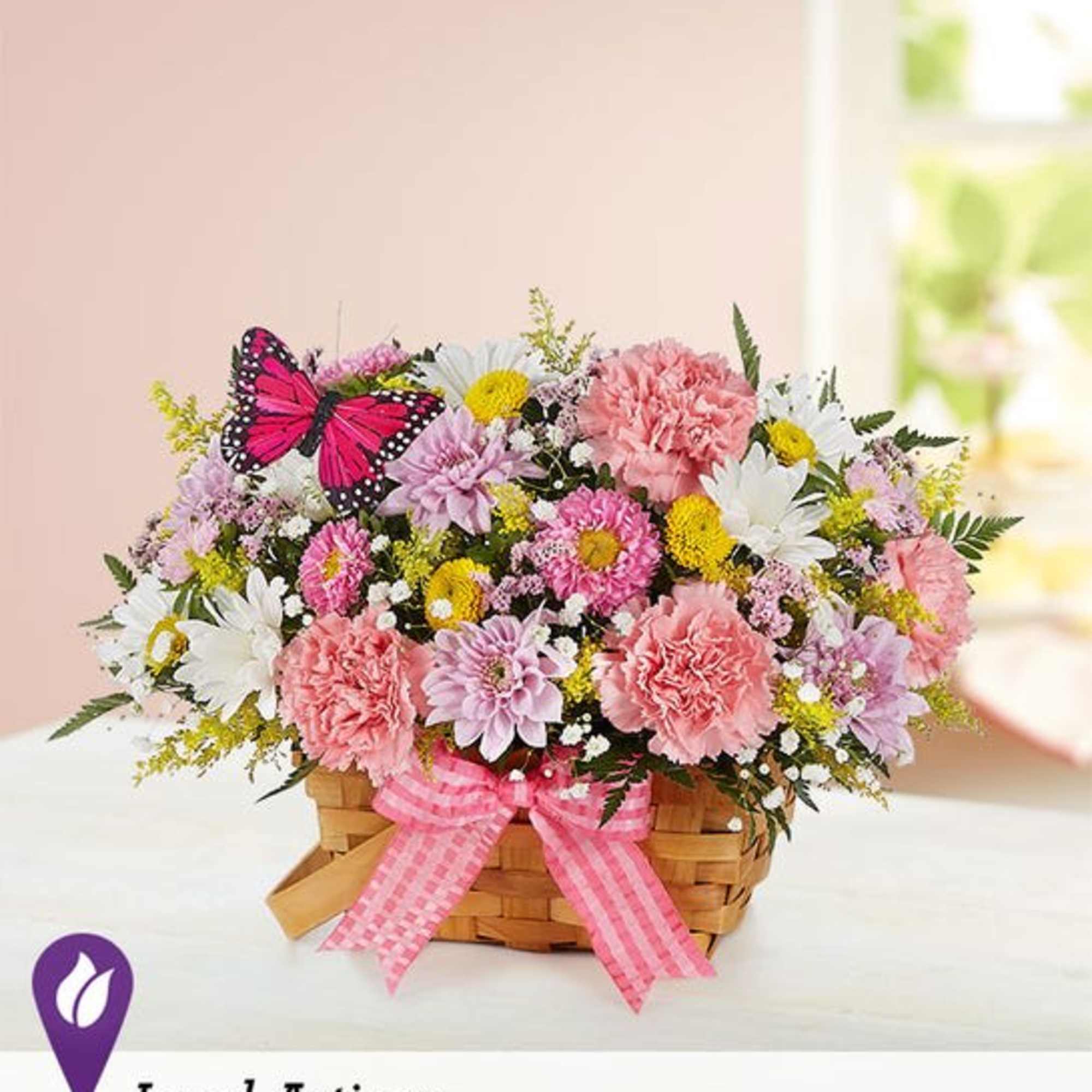 Our charming basket of blooms is an easy, go-to gift for any