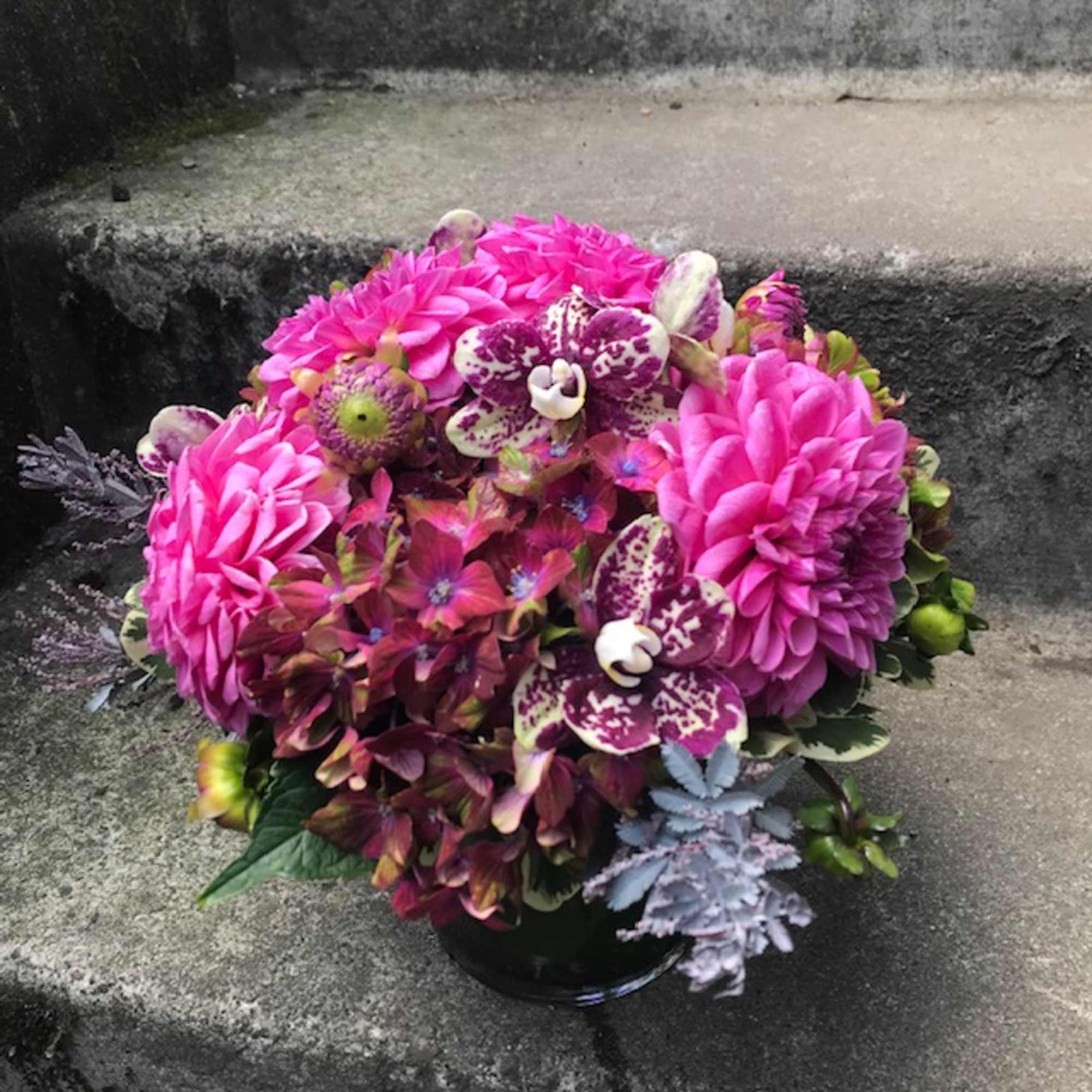 A compact arrangement perfectly scaled for a small desk, nightstand or side