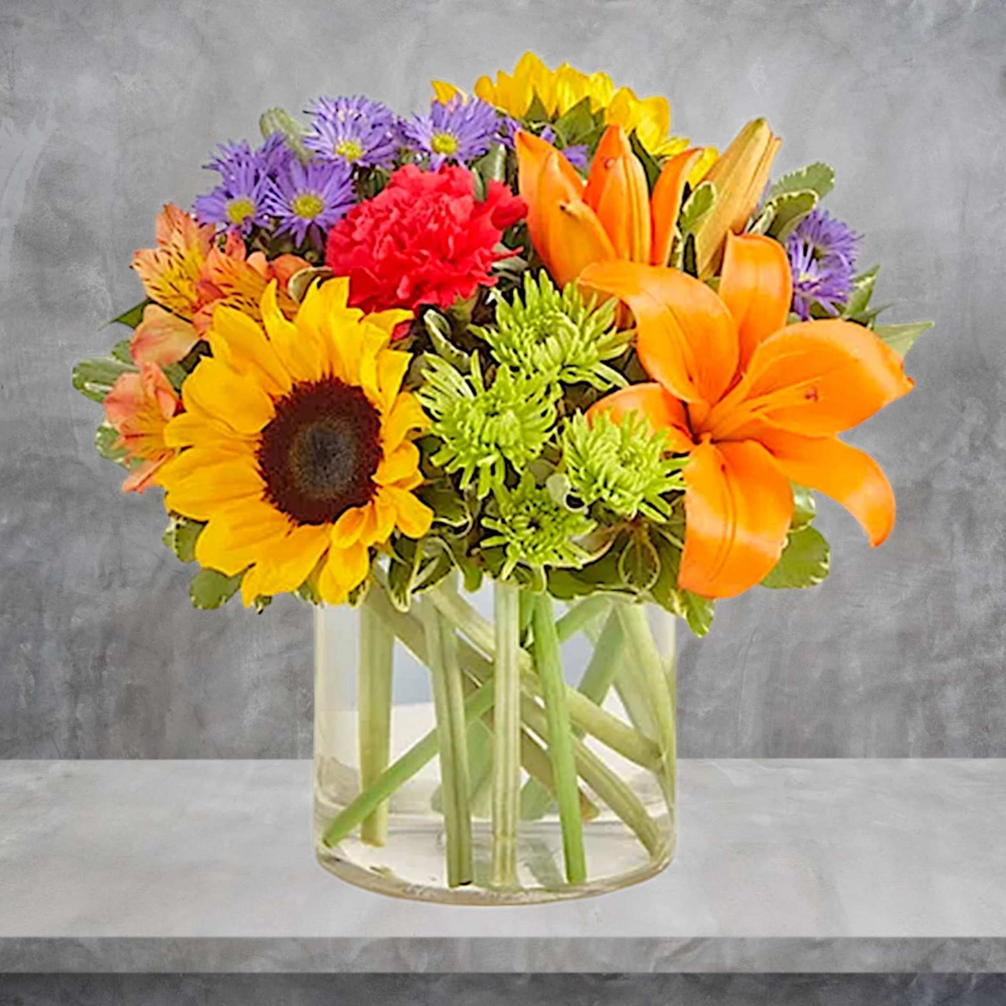 Like a comforting embrace, the vibrant arrangement expresses your warm condolences beautifully;