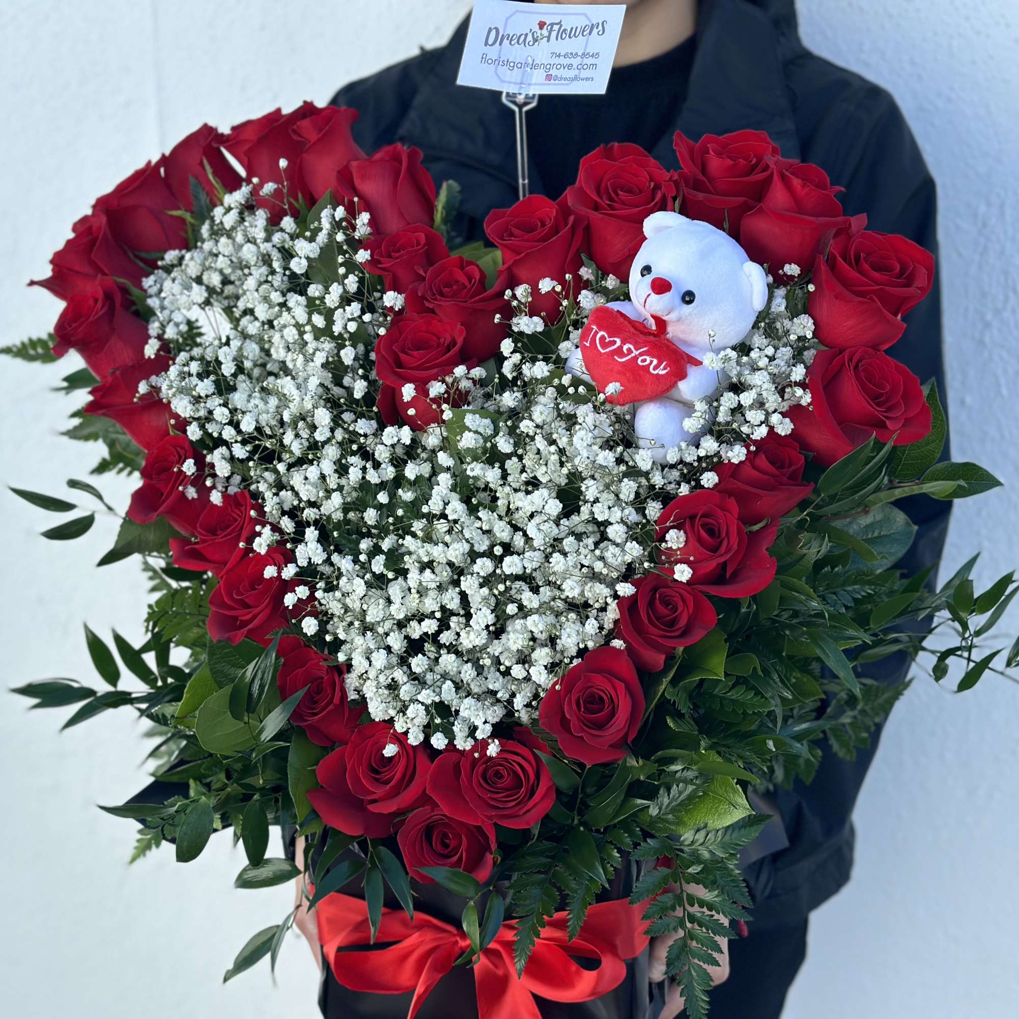 Give them your heart with roses shaped into a heart.  Give them your heart with roses shaped into a heart.