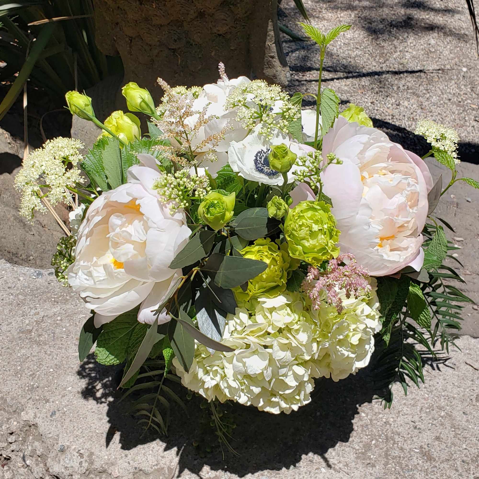 A seasonal collection of mixed blush and white tones with bright green