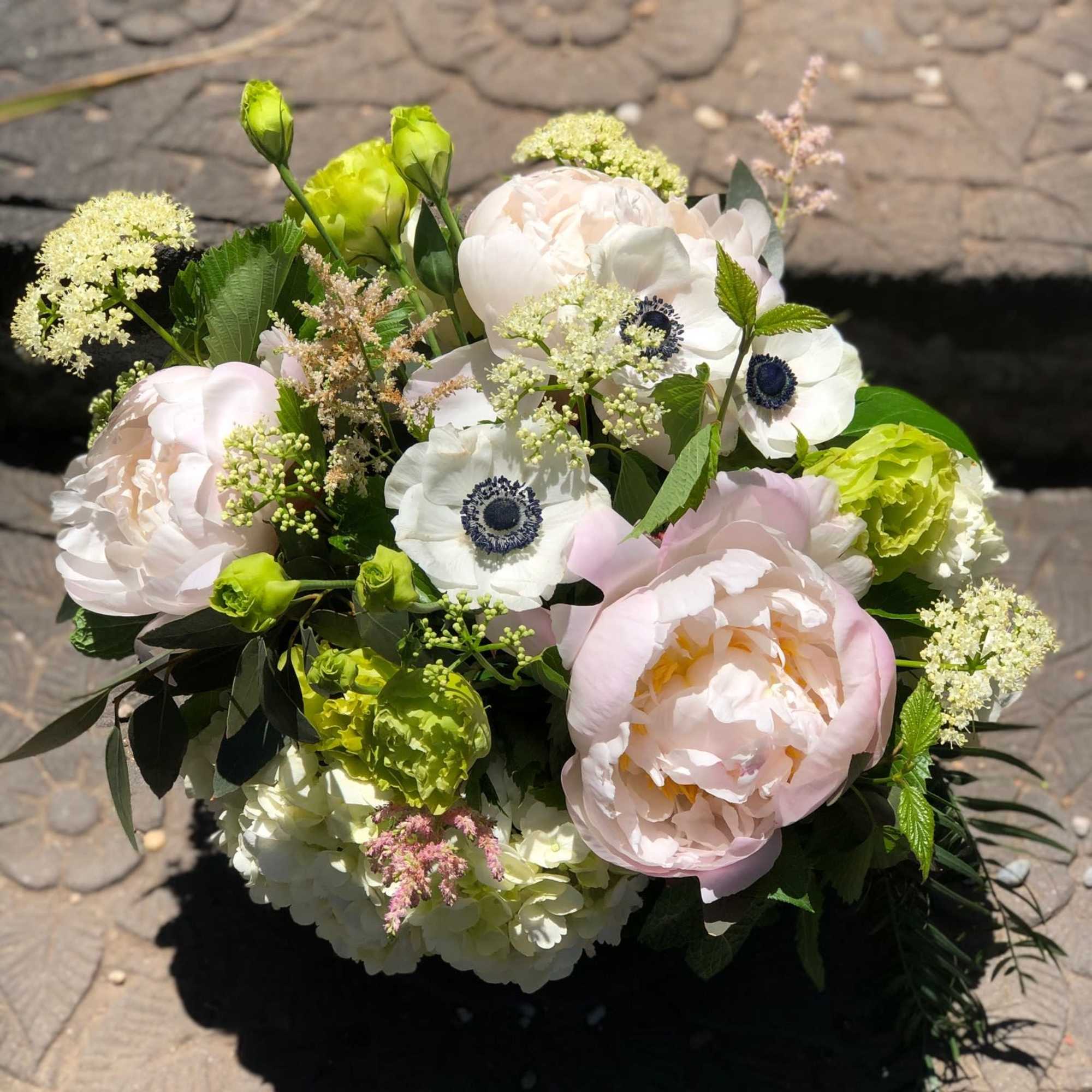 A seasonal collection of mixed blush and white tones with bright green