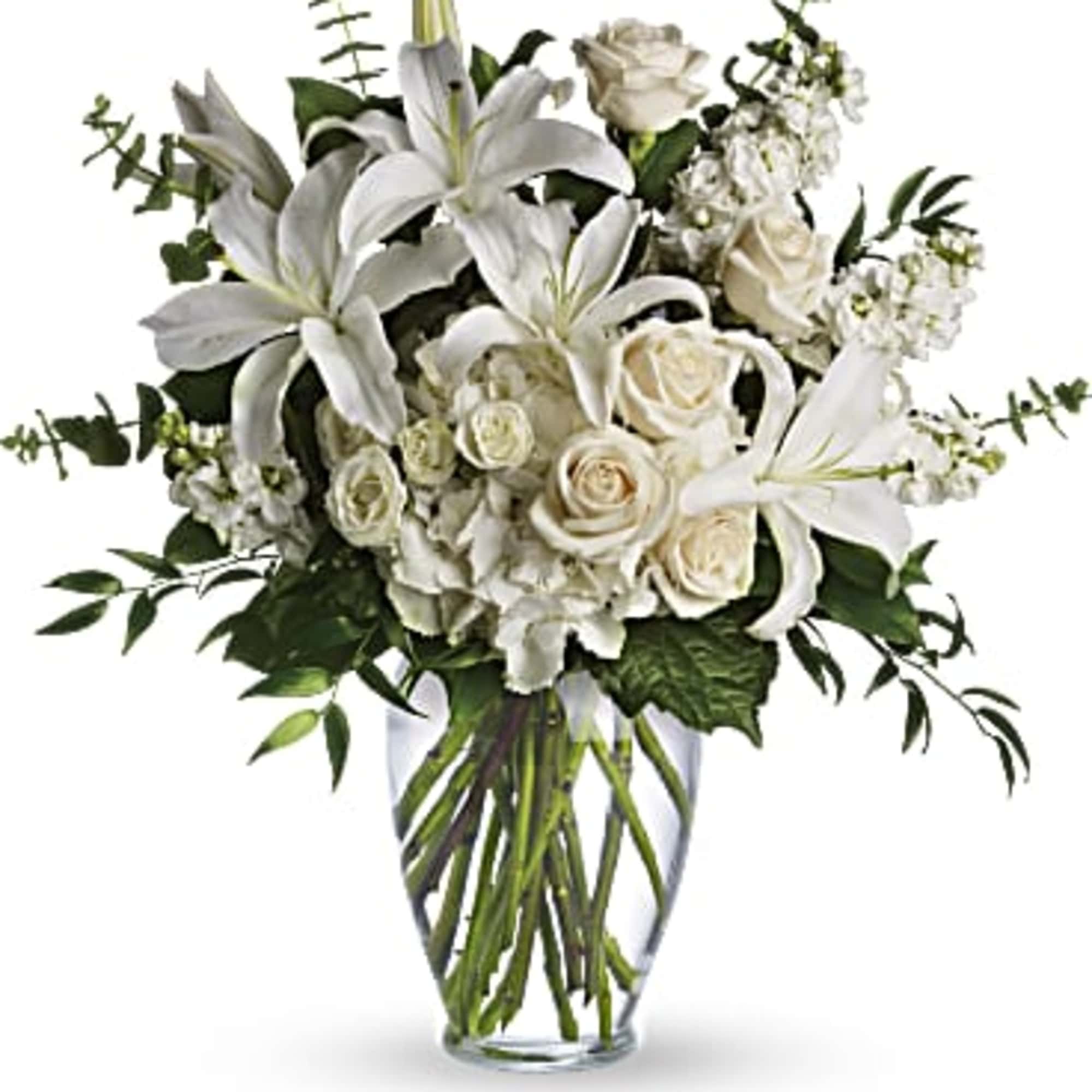 A lovely bouquet to soothe and comfort, a variety of white and