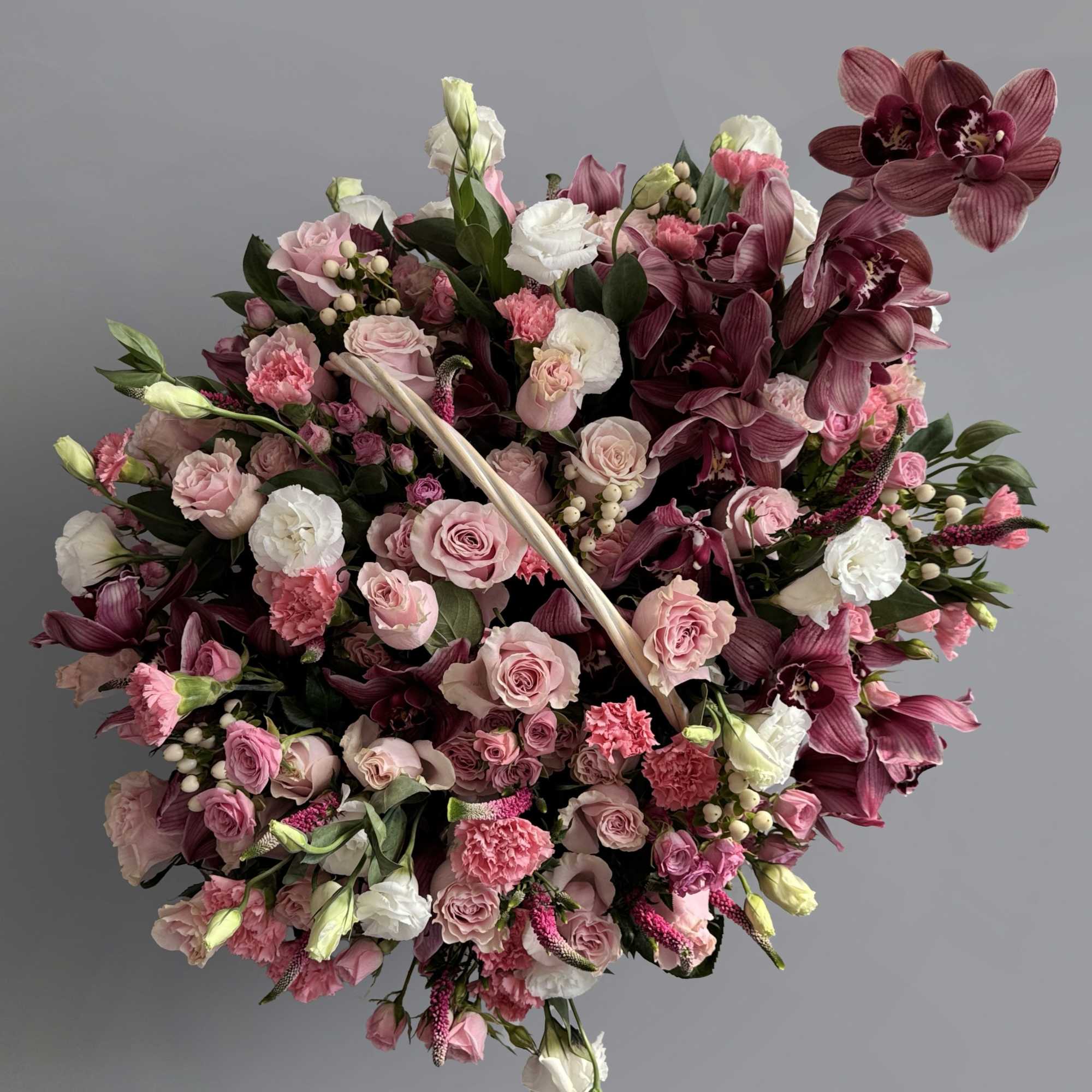 Fall in love with our stunning pink flower basket. This charming arrangement