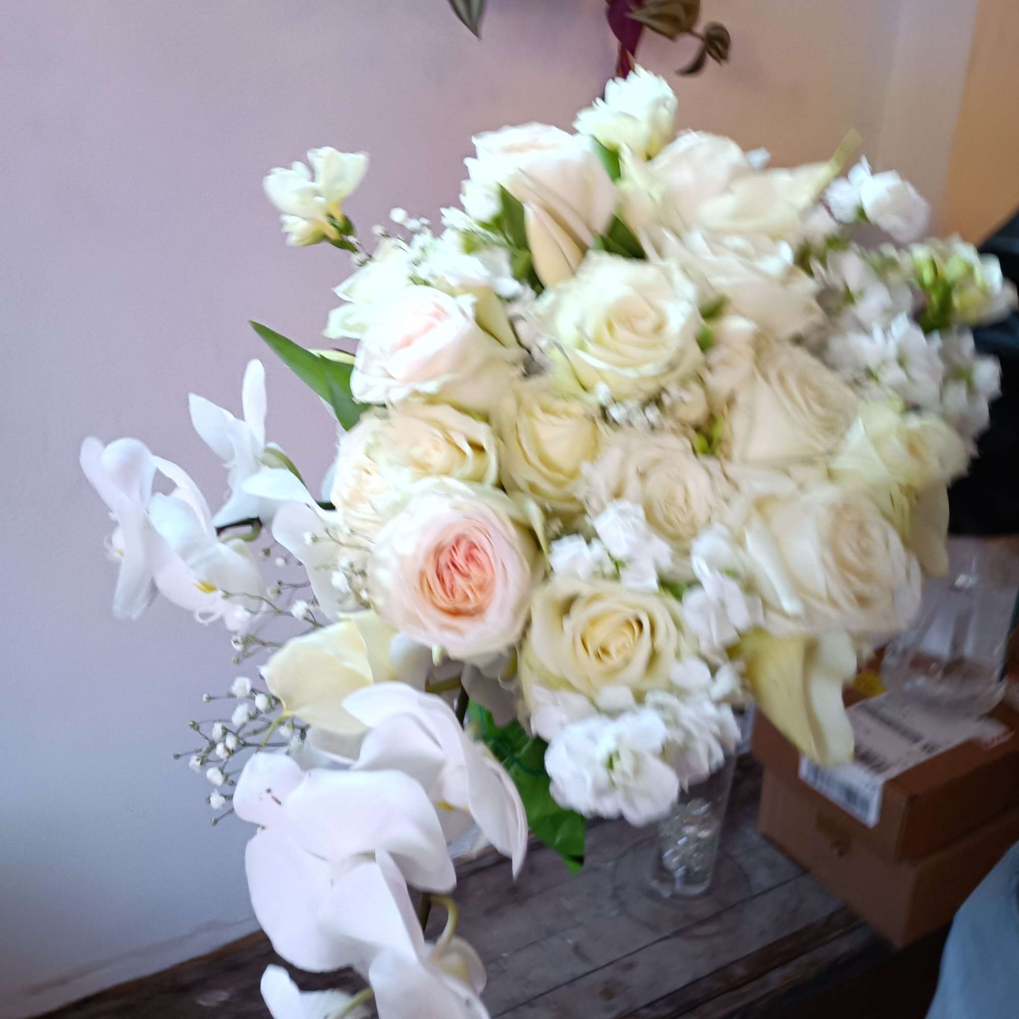 Beautiful classical/boho bridal bouquet with white phalaenopsis orchids, garden, standard and spray