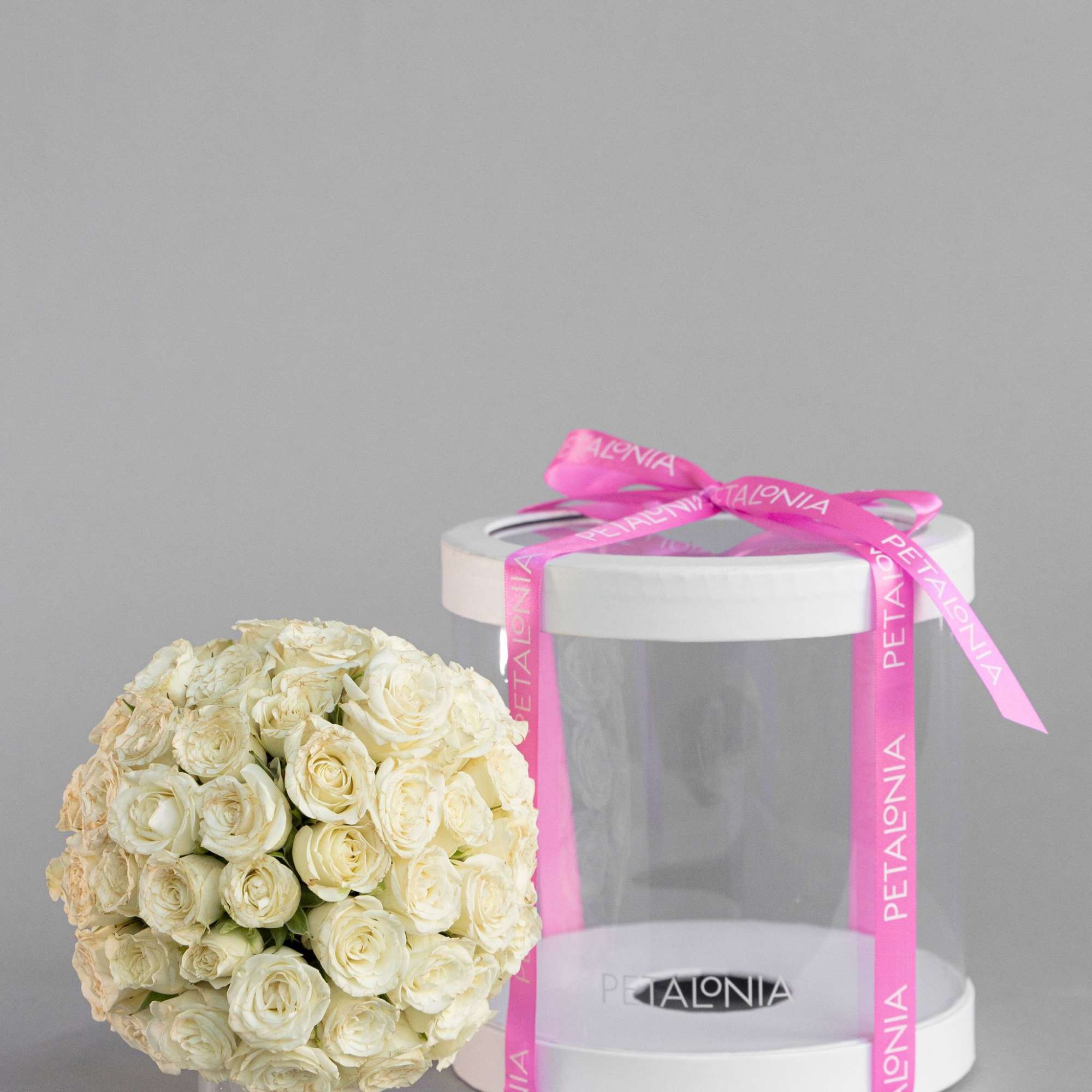 A gift and flower in one, this exquisite spherical arrangement of mini