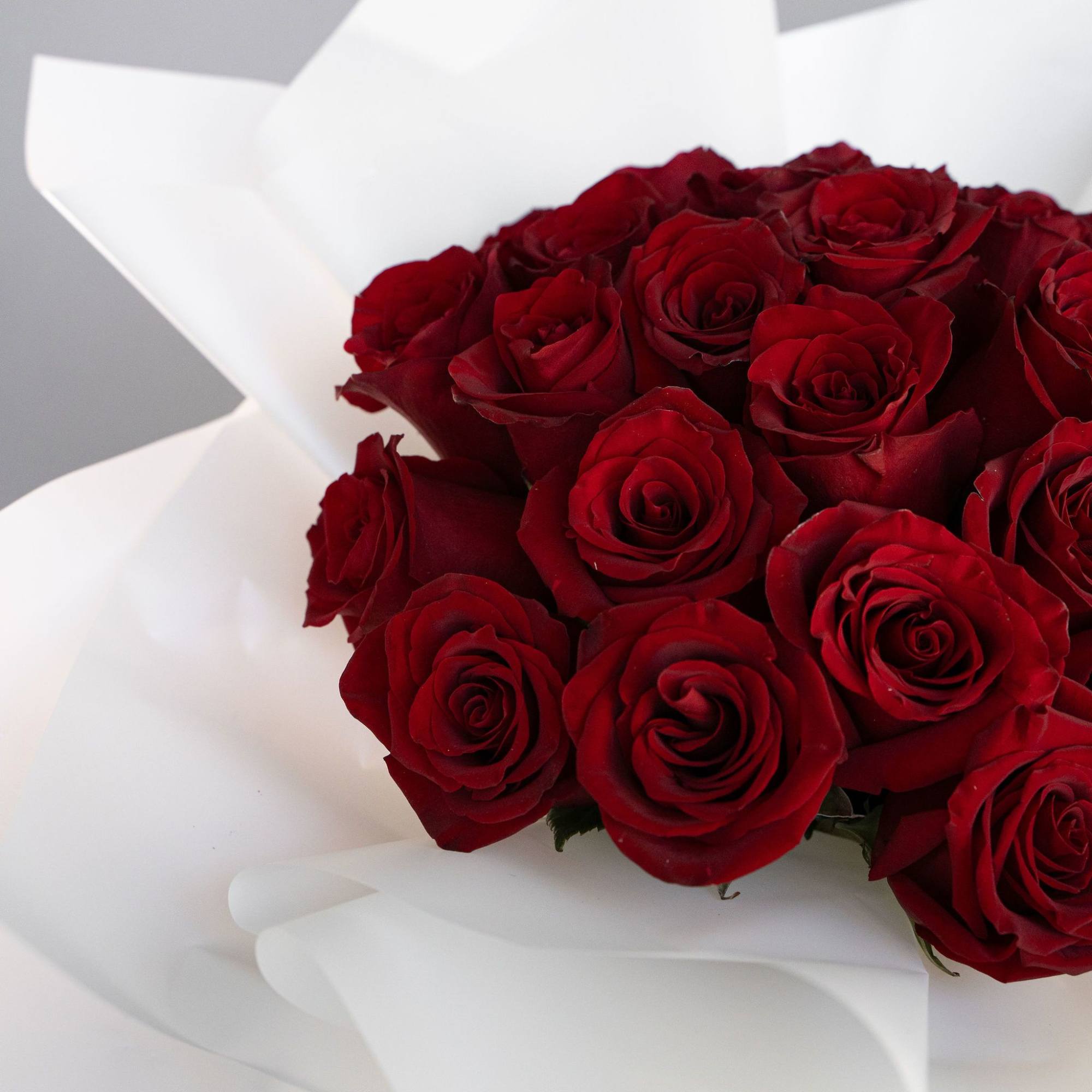 Experience timeless beauty with our preserved rose arrangement, elegantly displayed in a