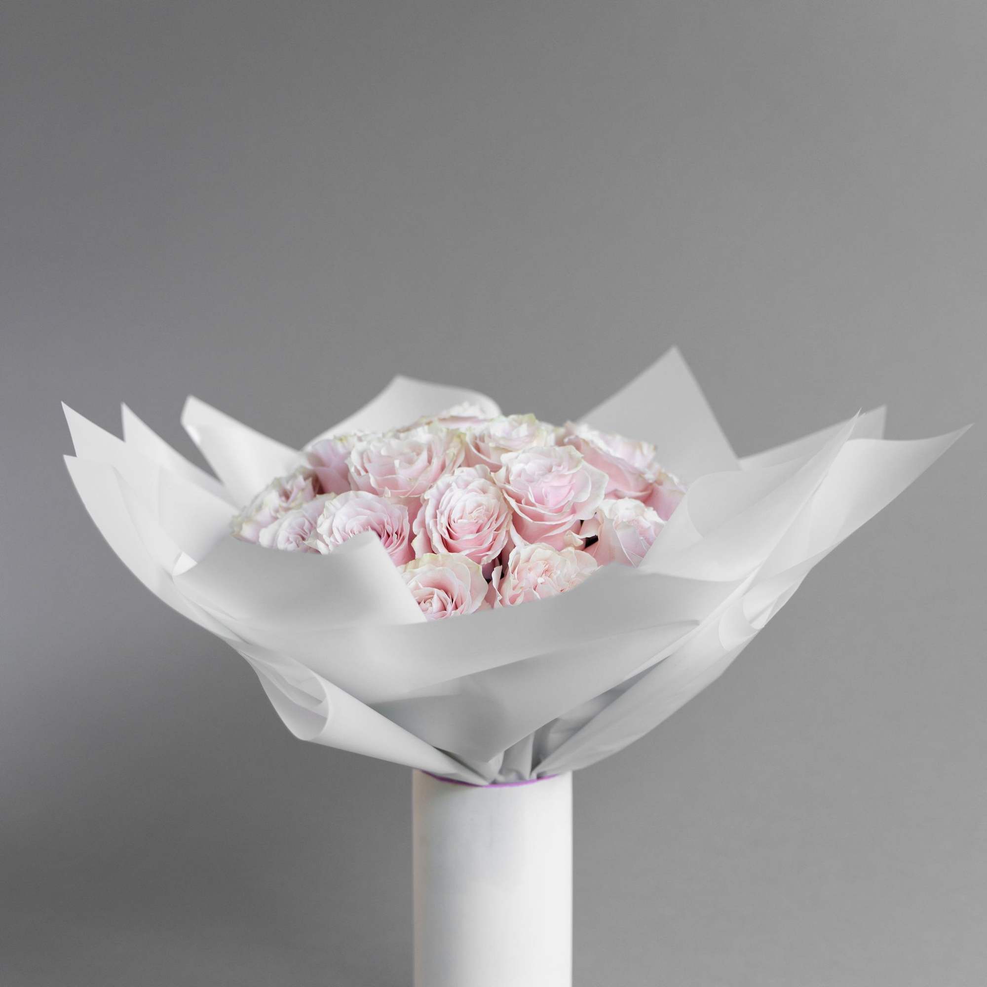 Experience timeless beauty with our preserved rose arrangement, elegantly displayed in a