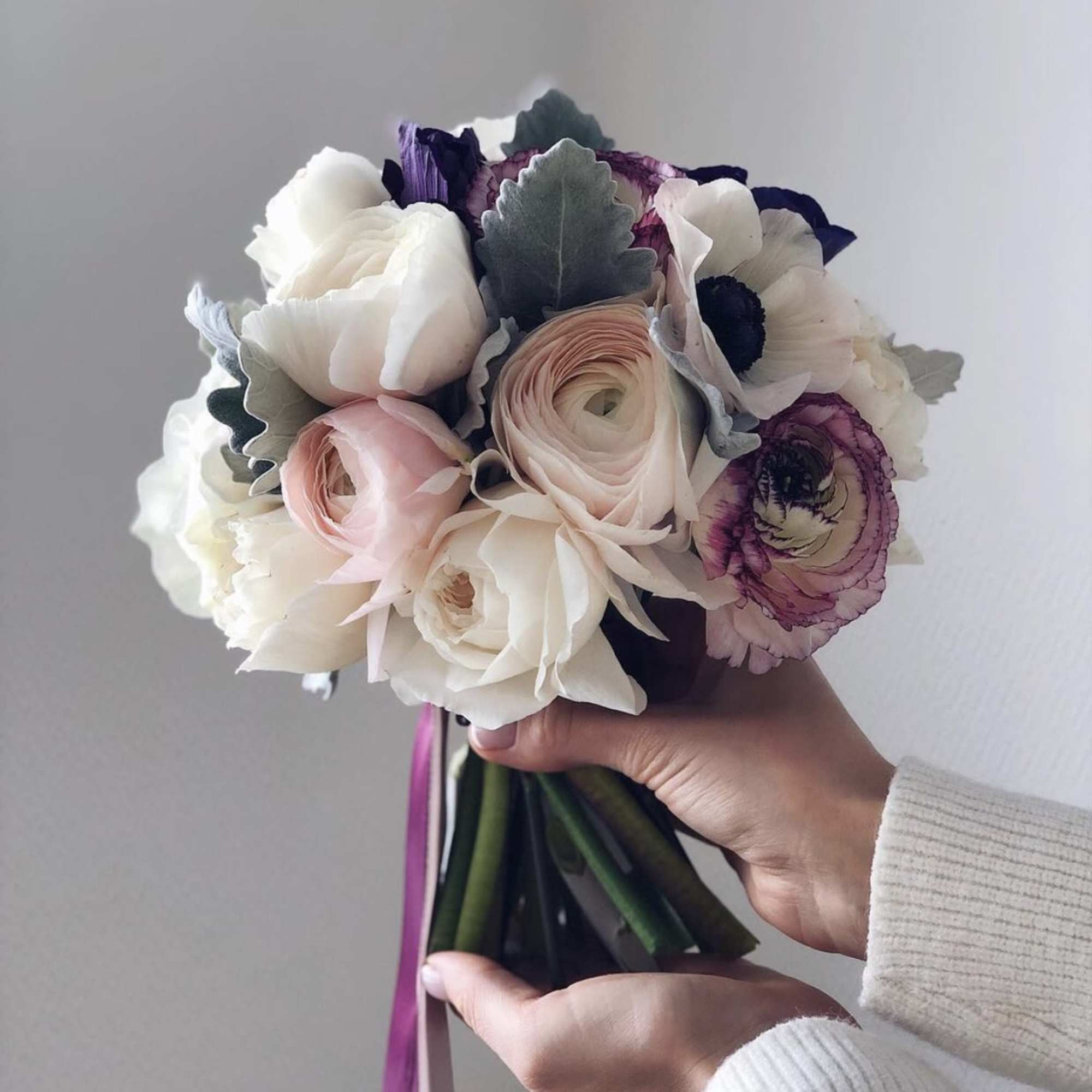 This bridal bouquet is made in a classic round shape from delicate