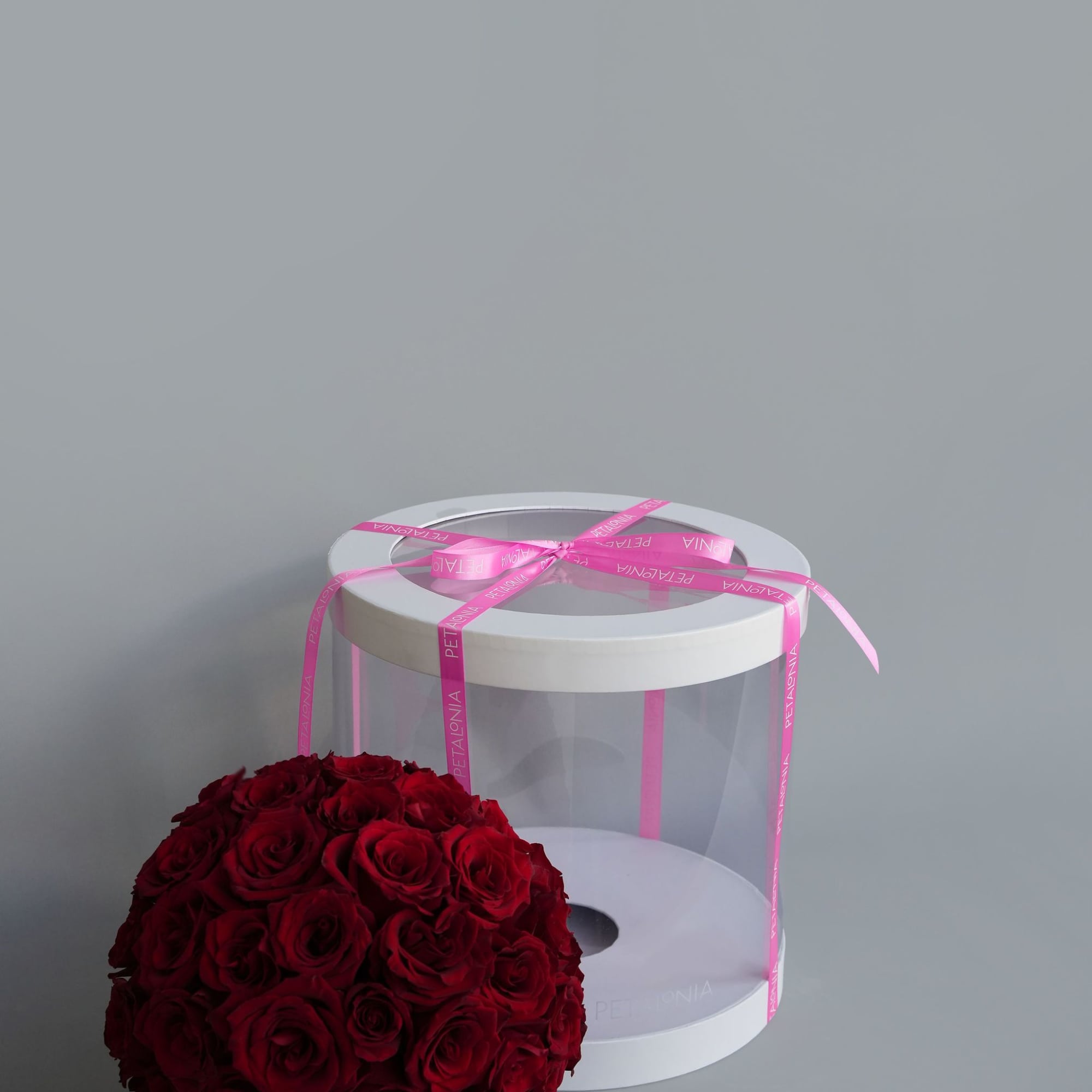 A gift and flowers in one, this exquisite spherical arrangement of mini