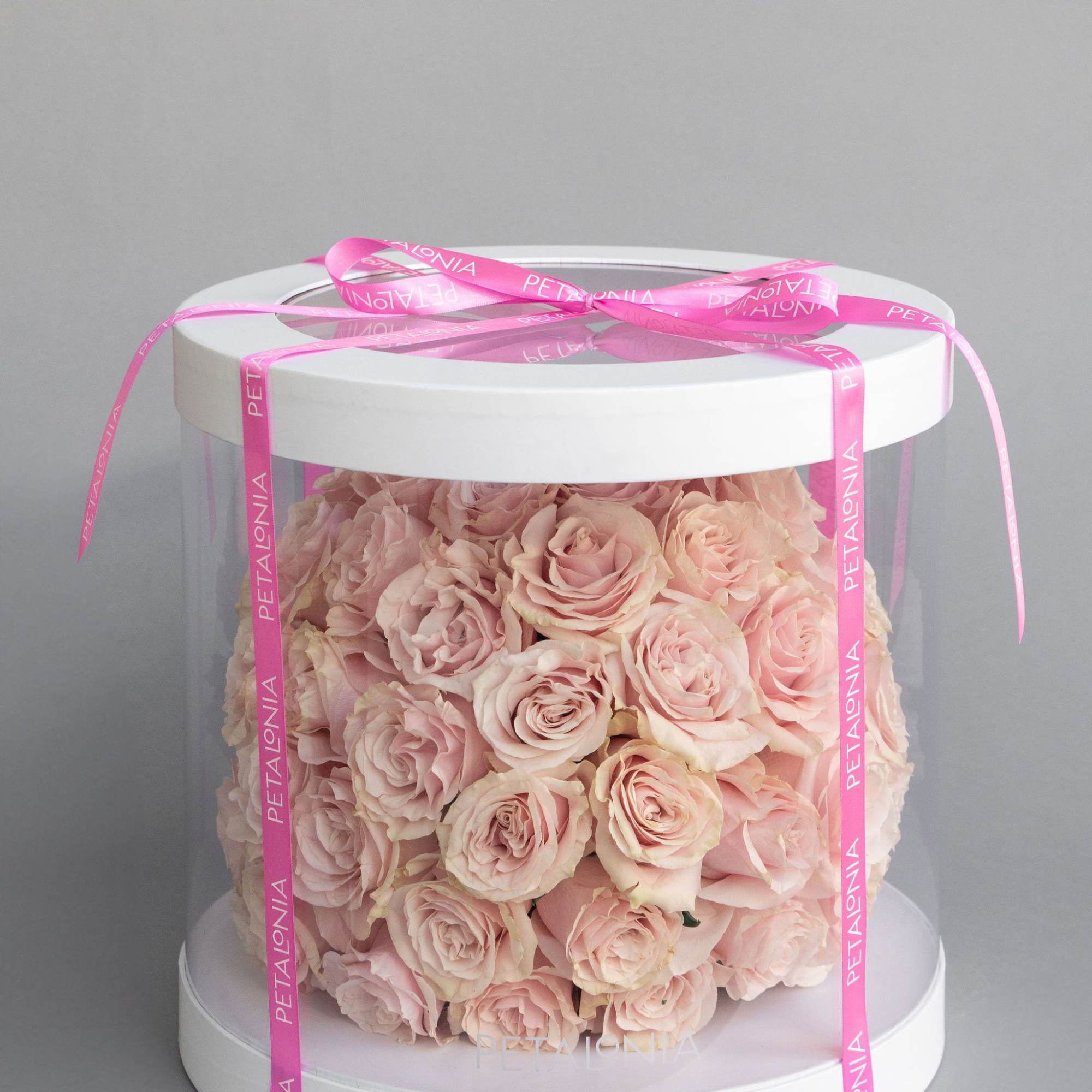 A gift and flowers in one, this exquisite spherical arrangement of mini