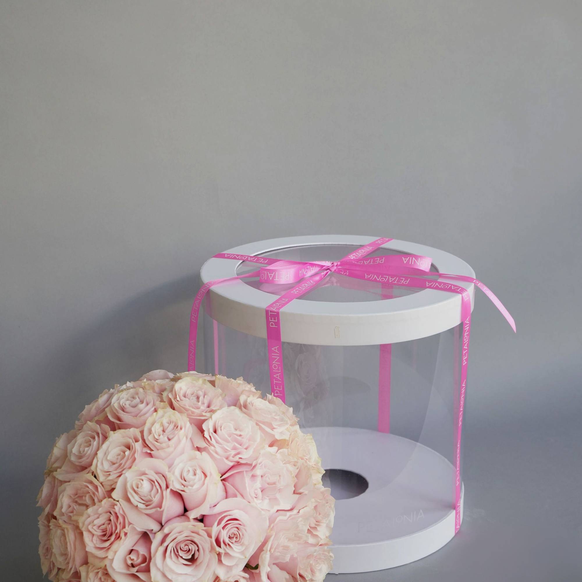 A gift and flowers in one, this exquisite spherical arrangement of mini