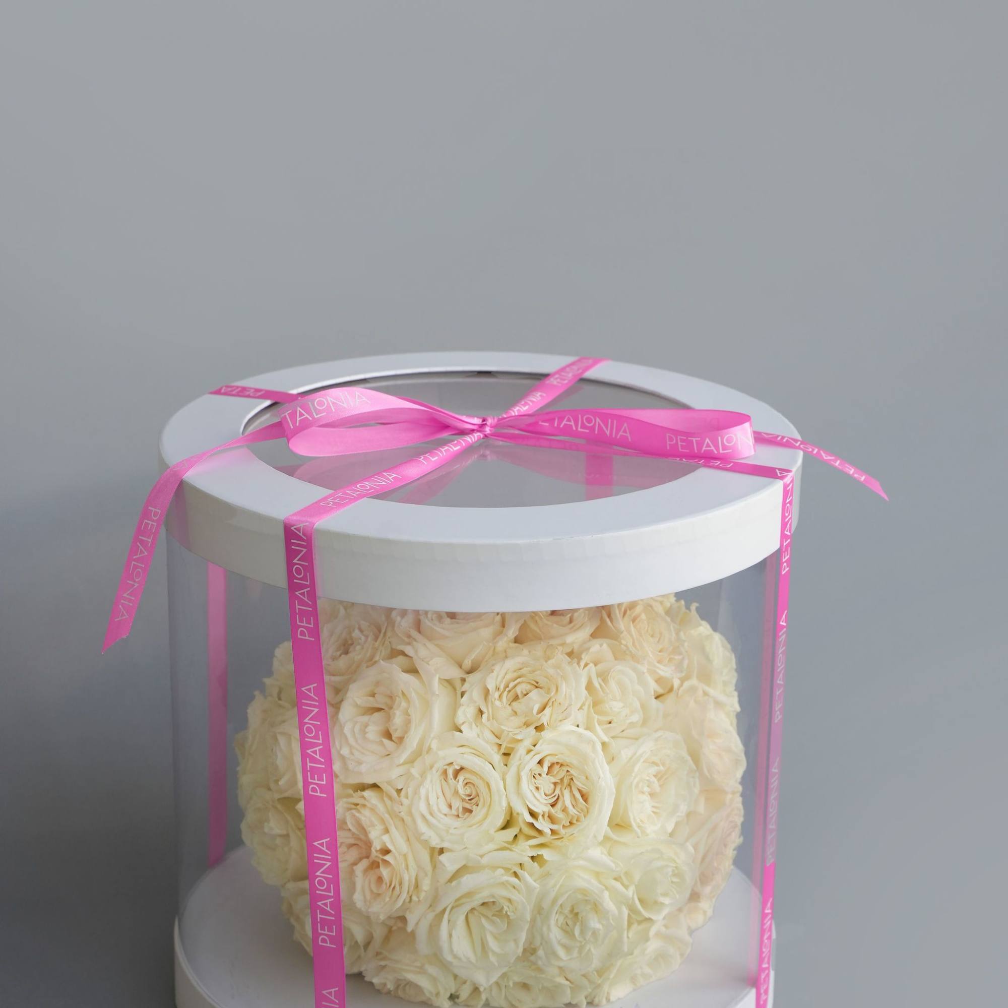 Experience timeless beauty with our preserved rose arrangement, thoughtfully presented in a