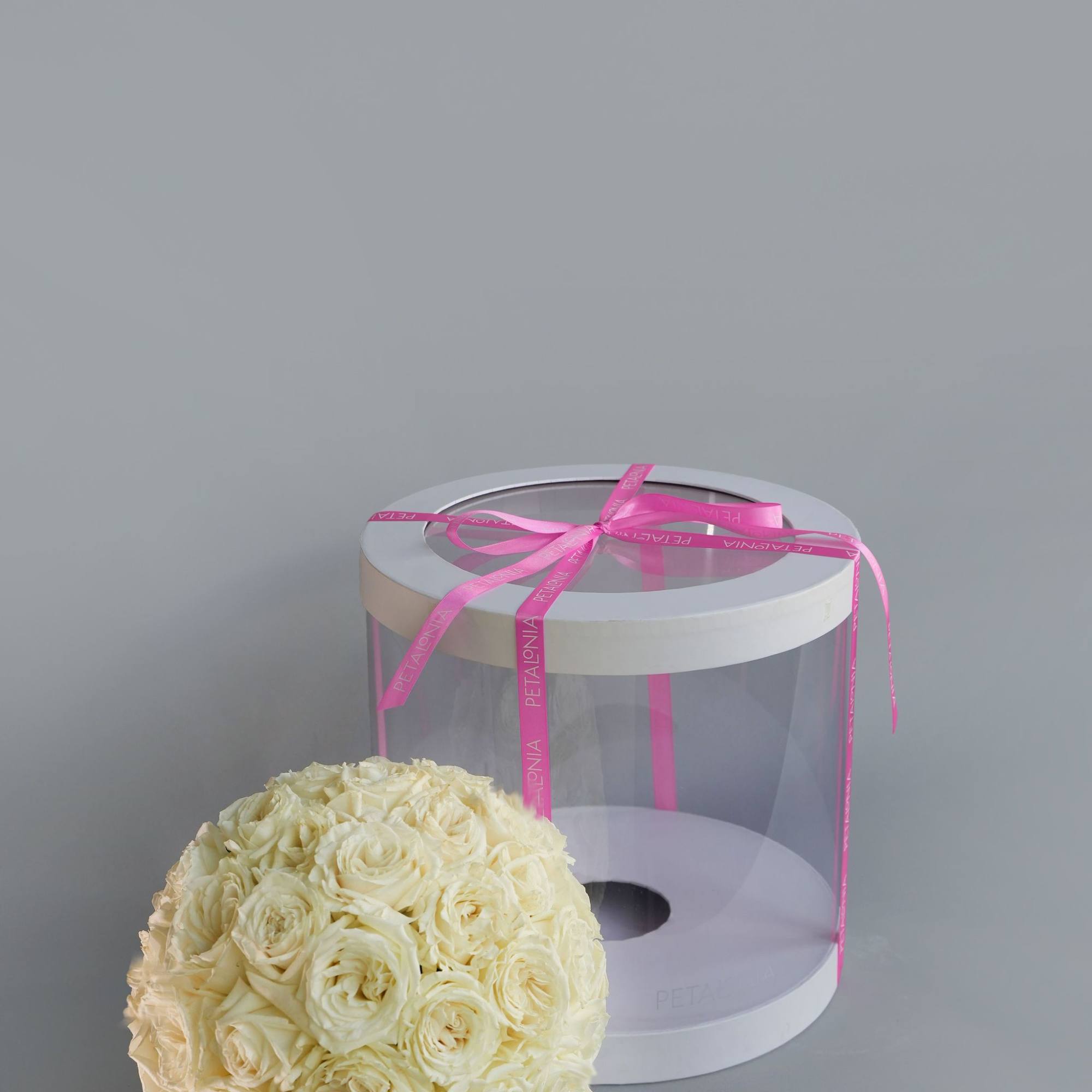 Experience timeless beauty with our preserved rose arrangement, thoughtfully presented in a