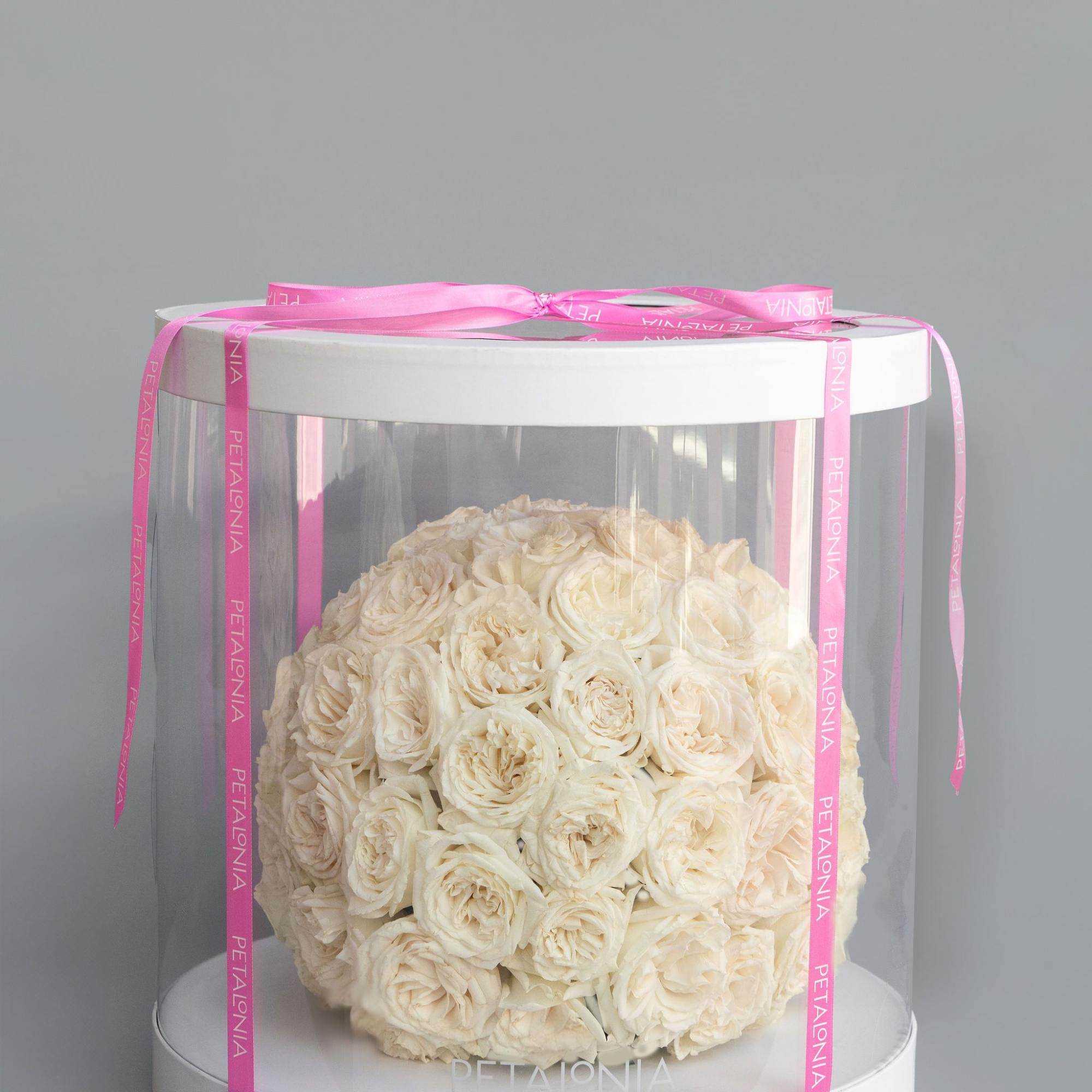 A gift and flowers in one, this exquisite spherical arrangement of mini