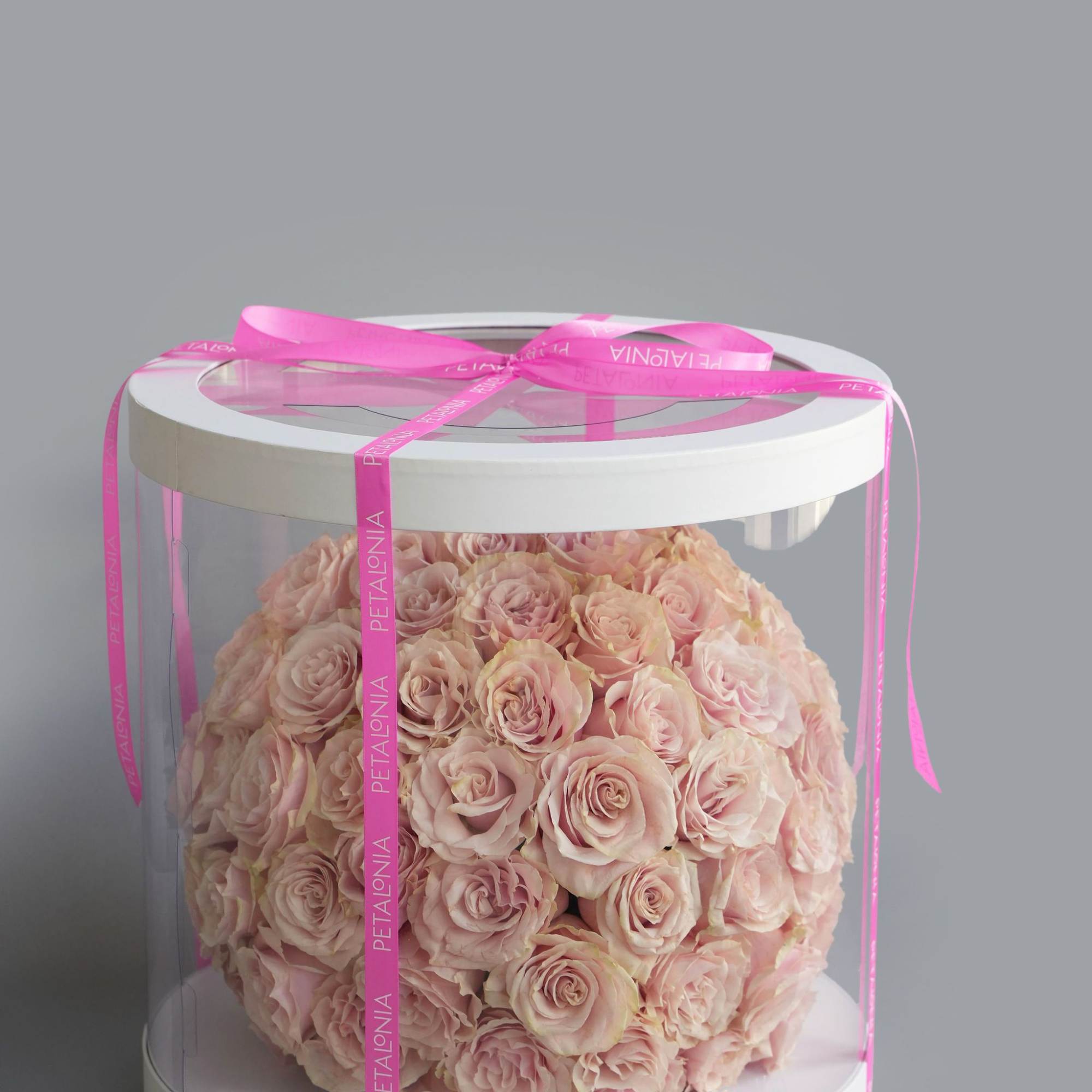 A gift and flowers in one, this exquisite spherical arrangement of mini