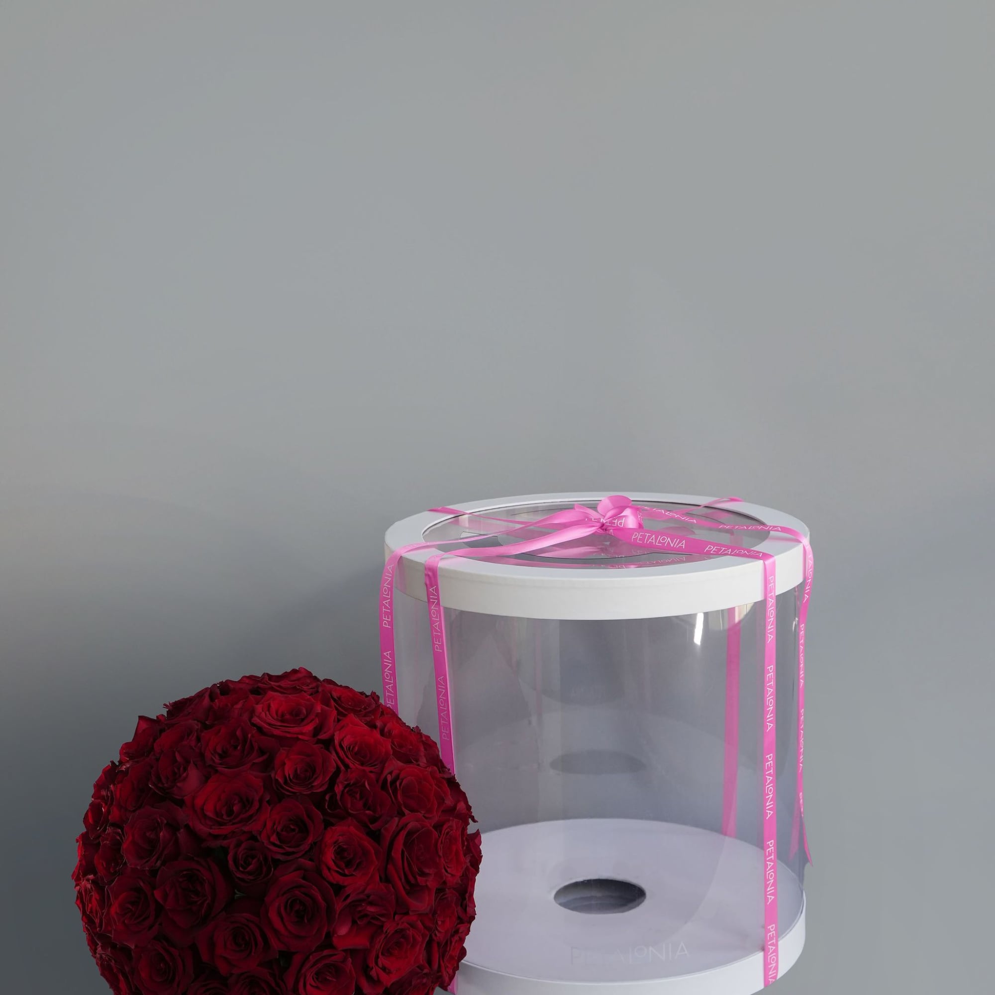 Experience timeless beauty with our preserved rose arrangement, thoughtfully presented in a