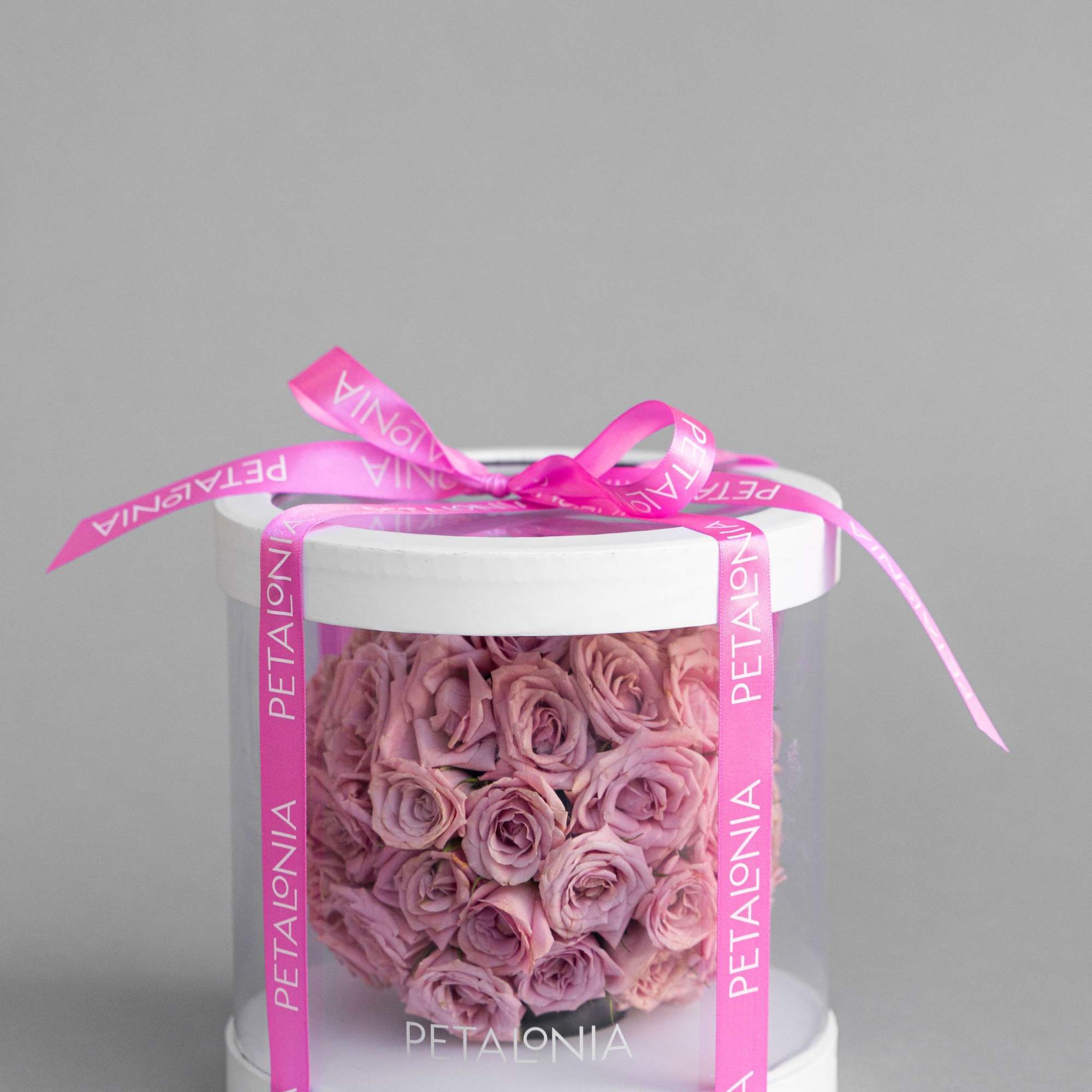 A gift and flower in one, this exquisite spherical arrangement of mini