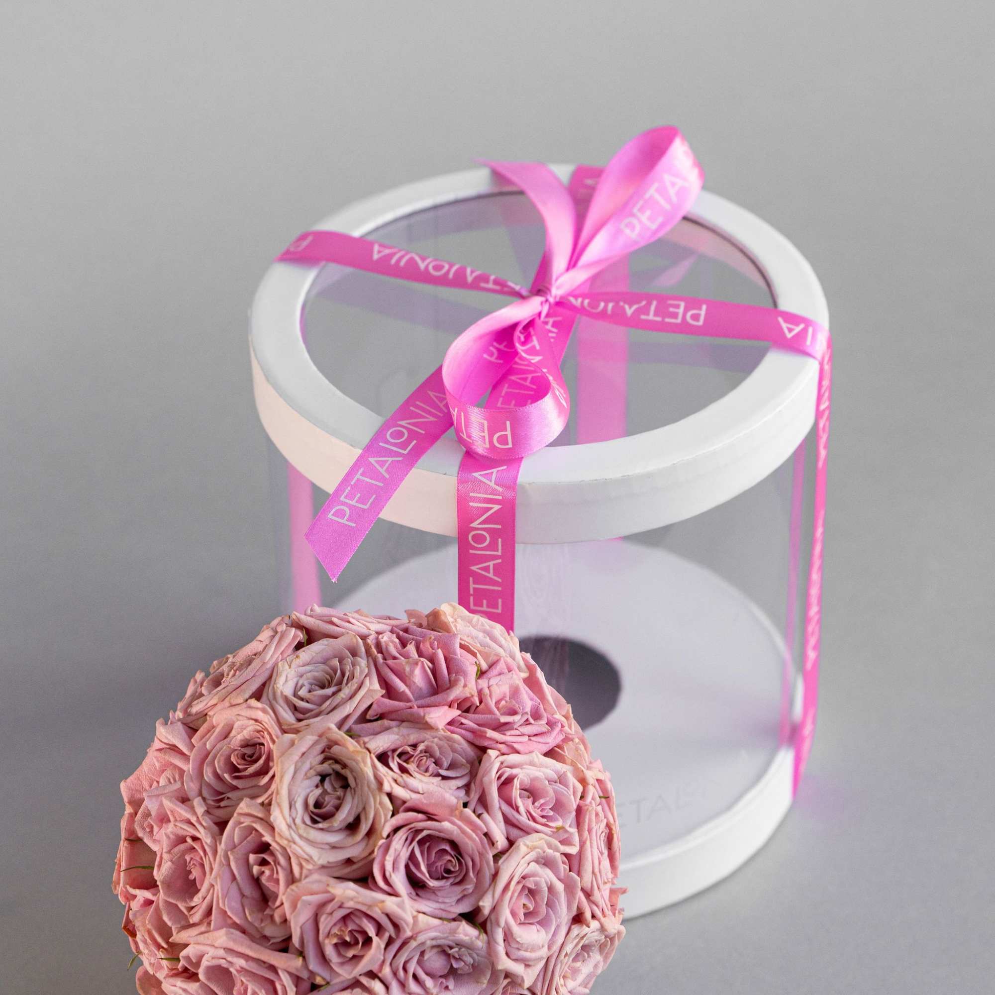 A gift and flower in one, this exquisite spherical arrangement of mini