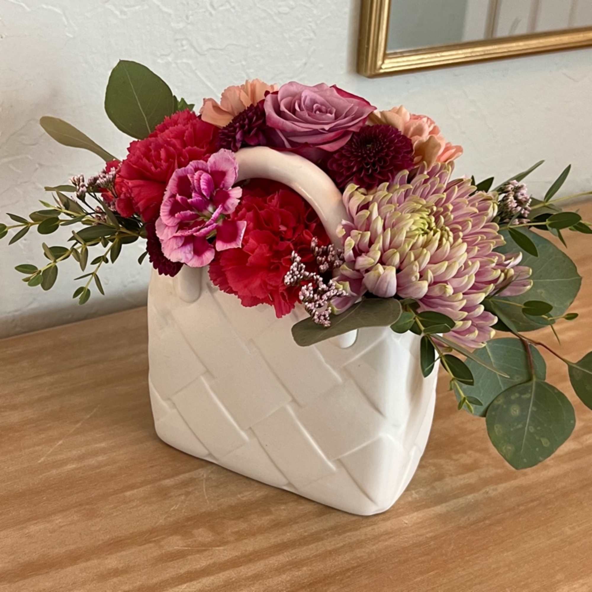 Andrea&#039;s Colorful Clutch is a fun little ceramic purse with colorful flowers