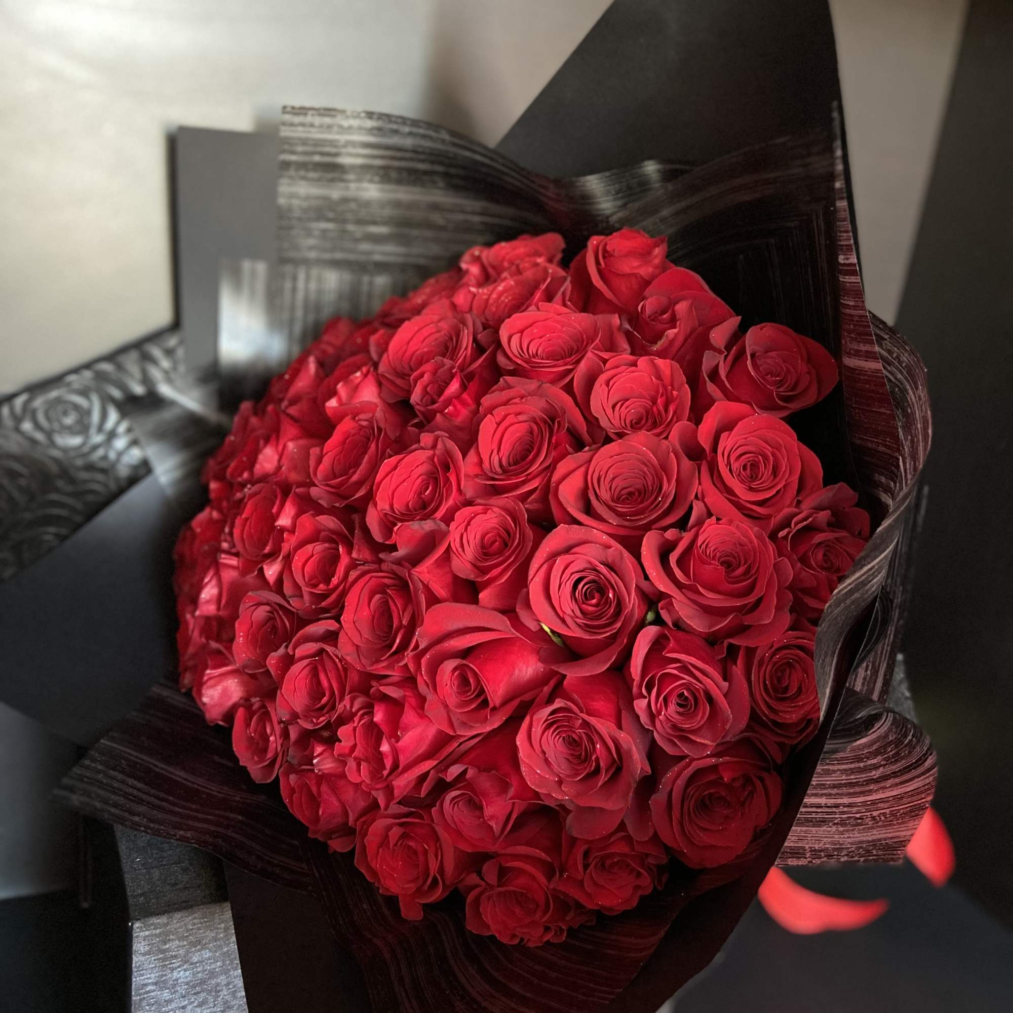 50 Red Roses with Wrapped Black Paper