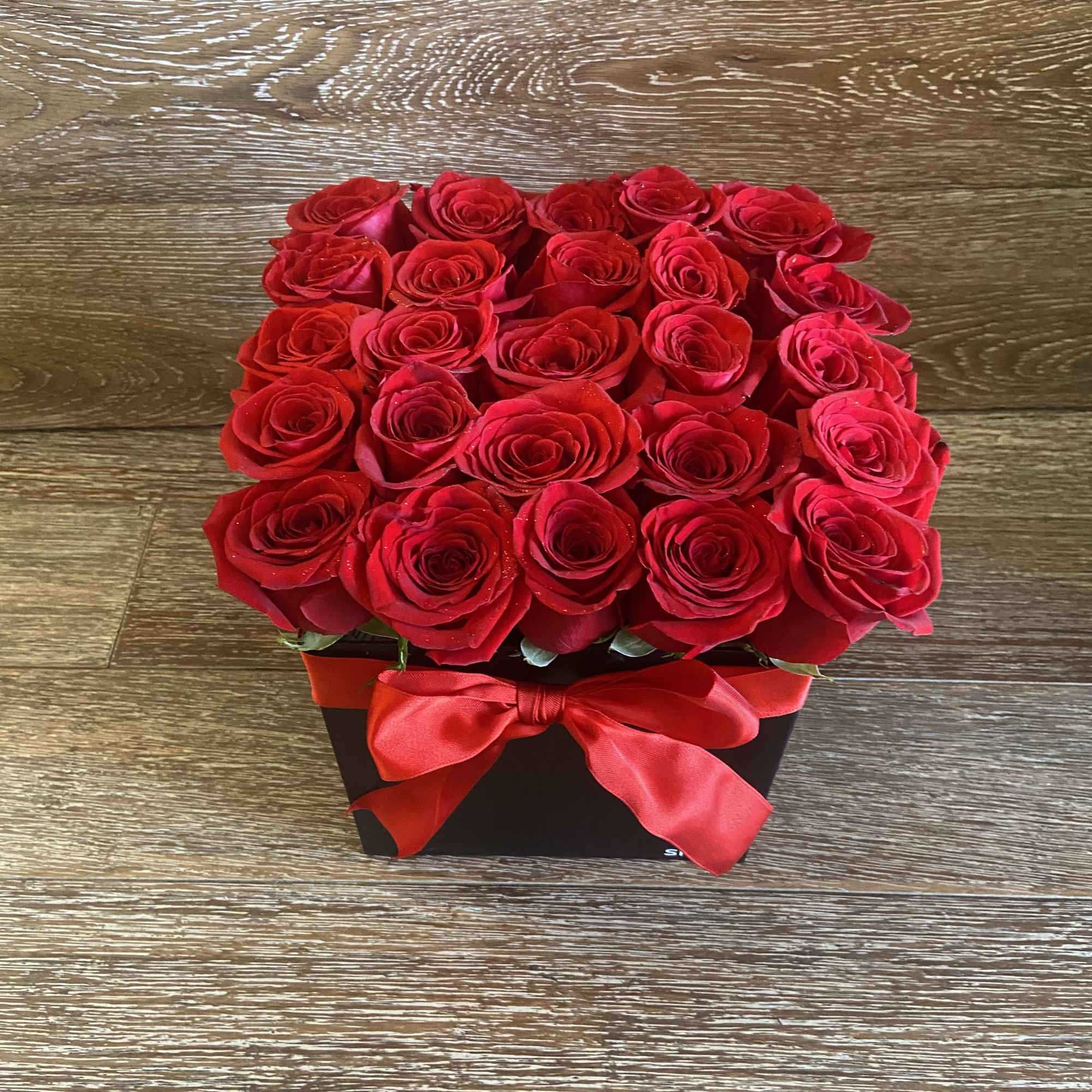 25 Red Roses, Black Square Box, Red Ribbon.