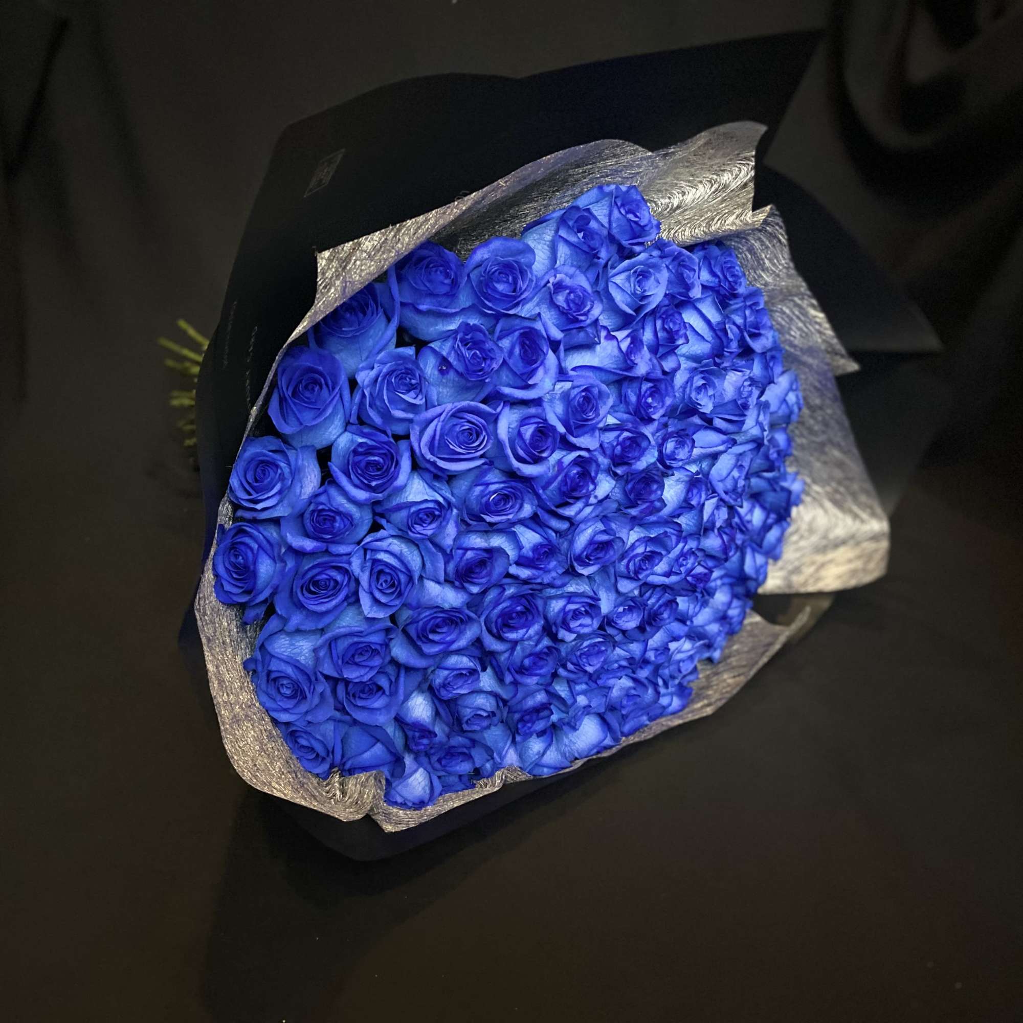 50 Beautiful Blue Roses, Wrapped with Black Paper.