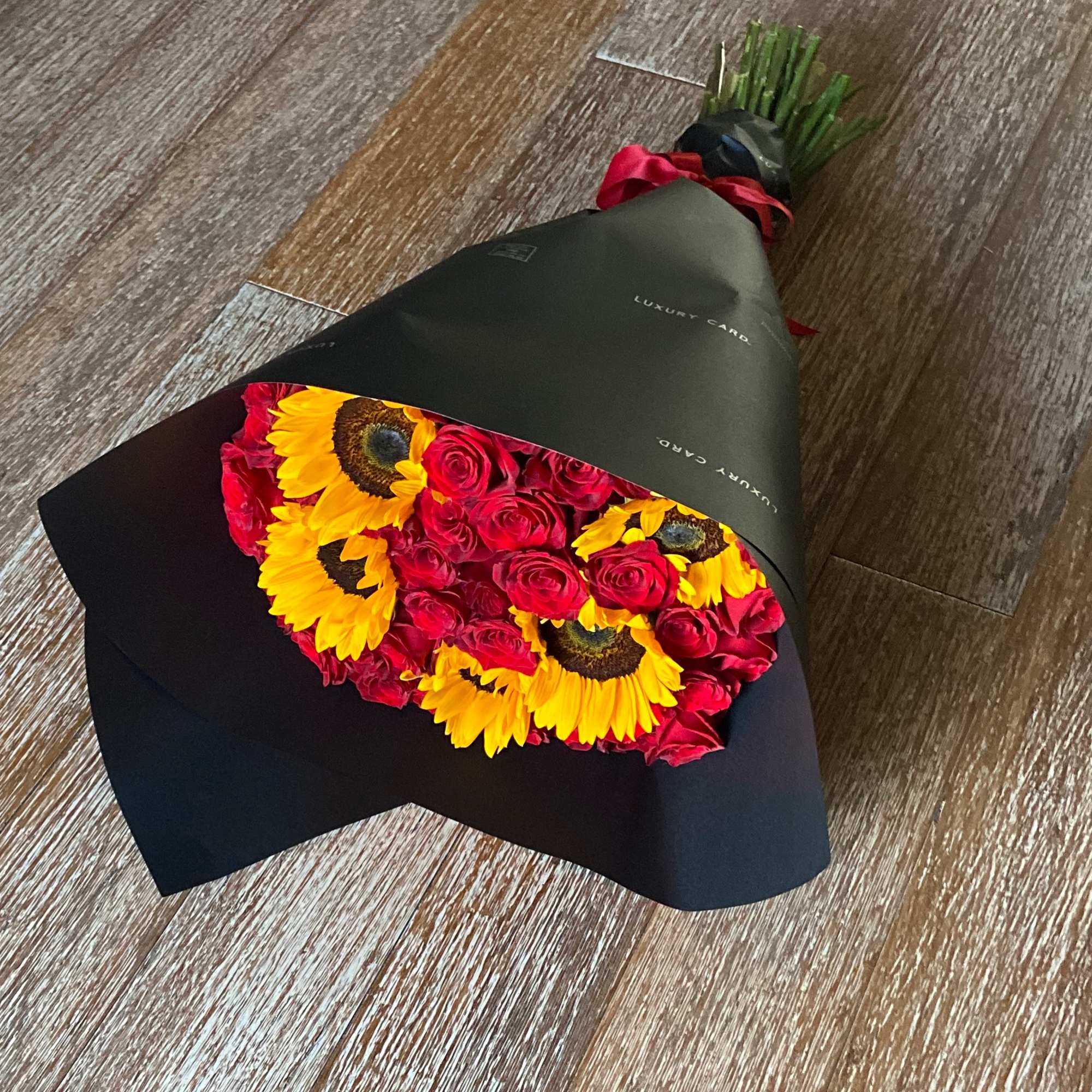 Bouquet with 50 Red Roses and 5 Sunflowers, wrap, Black, Clear o
