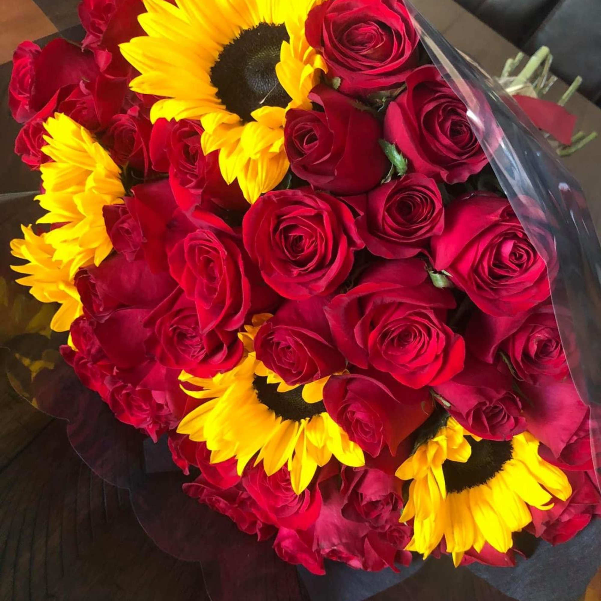 Bouquet with 50 Red Roses and 5 Sunflowers, wrap, Black, Clear o