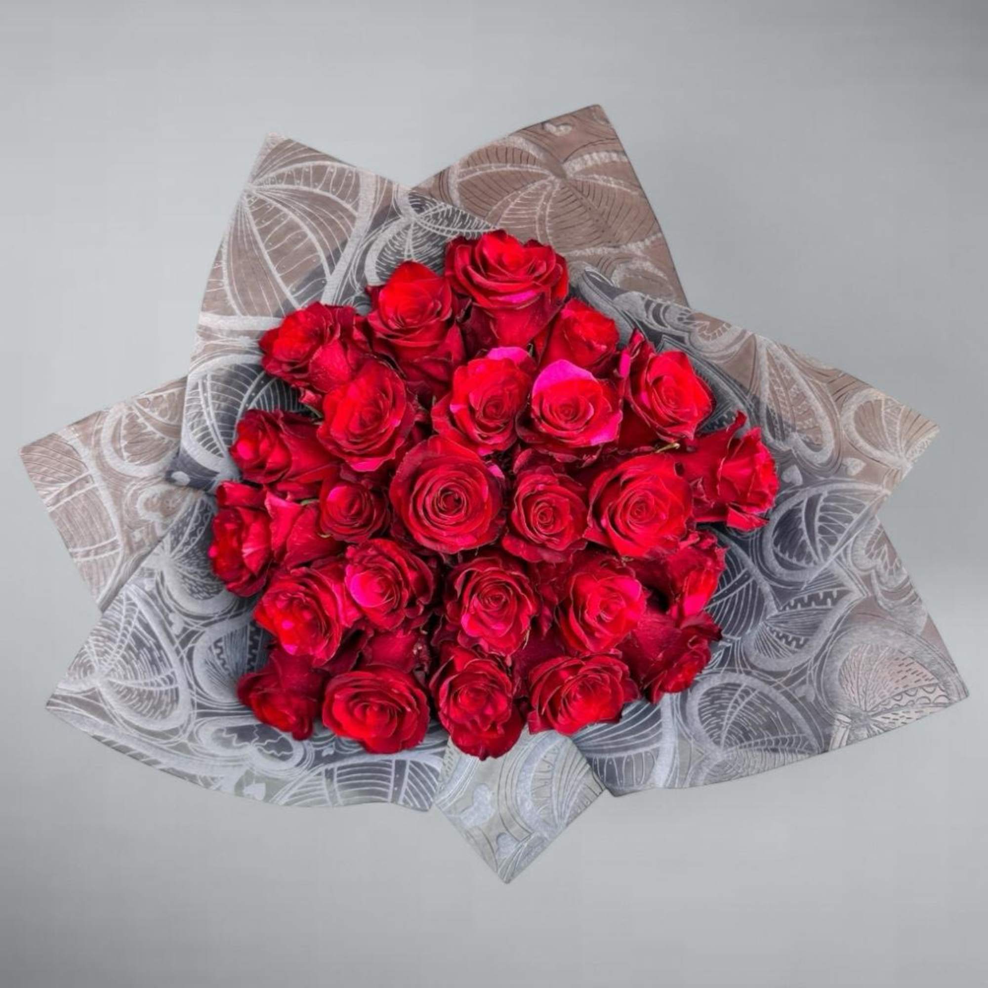 A subtle arrangement of roses, elegant and beautiful for any occasion. The