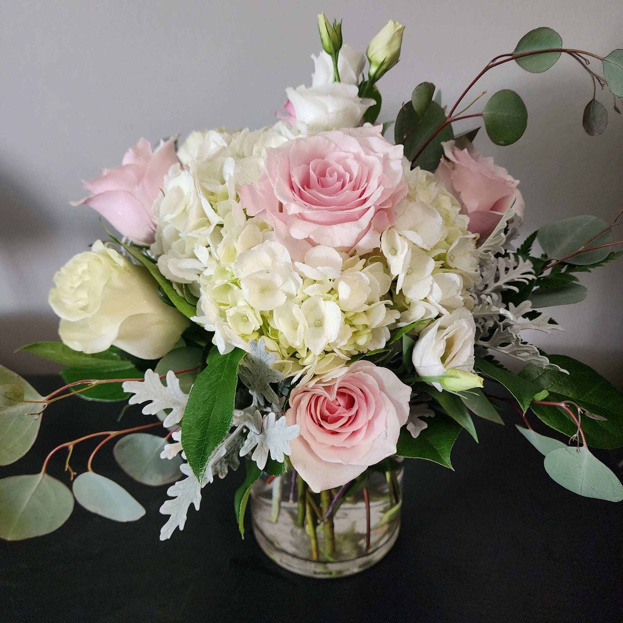 Soft and subtle for any occasion.  Designed with Hydrangeas, lisianthus, roses