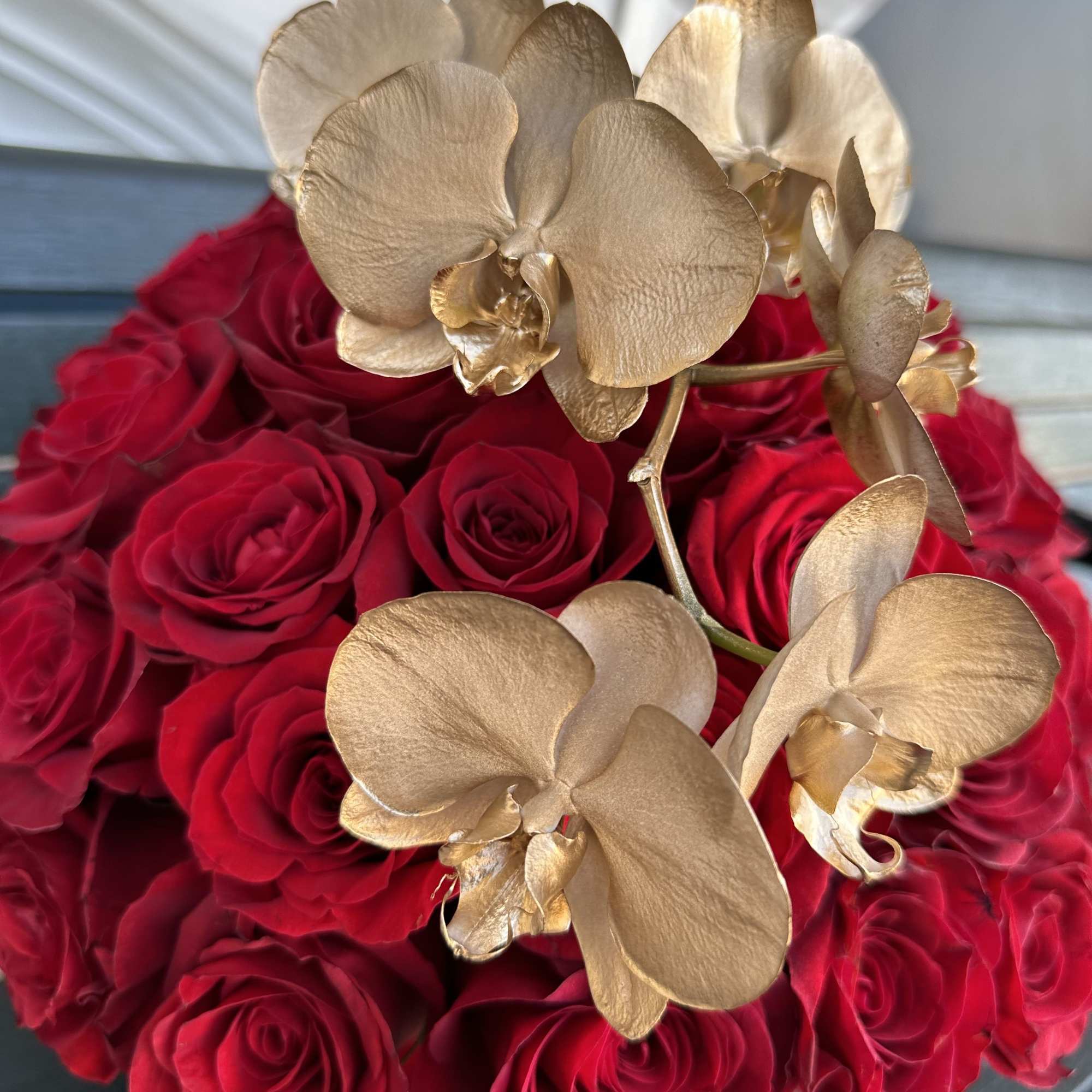 Our award-winning floral designers created this handcrafted unique VERSACE  design of Our award-winning floral designers created this handcrafted unique VERSACE  design of