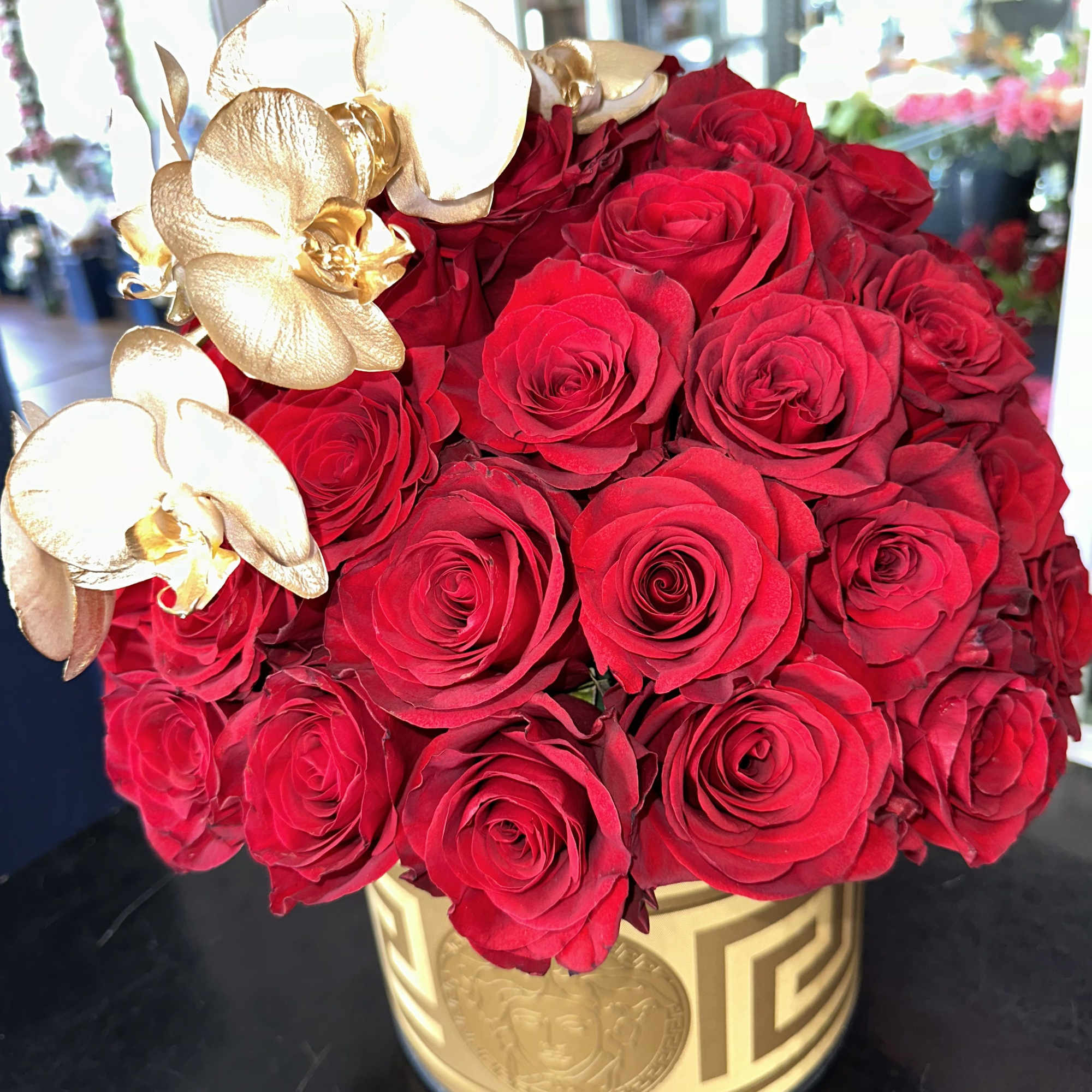 Our award-winning floral designers created this handcrafted unique VERSACE  design of Our award-winning floral designers created this handcrafted unique VERSACE  design of