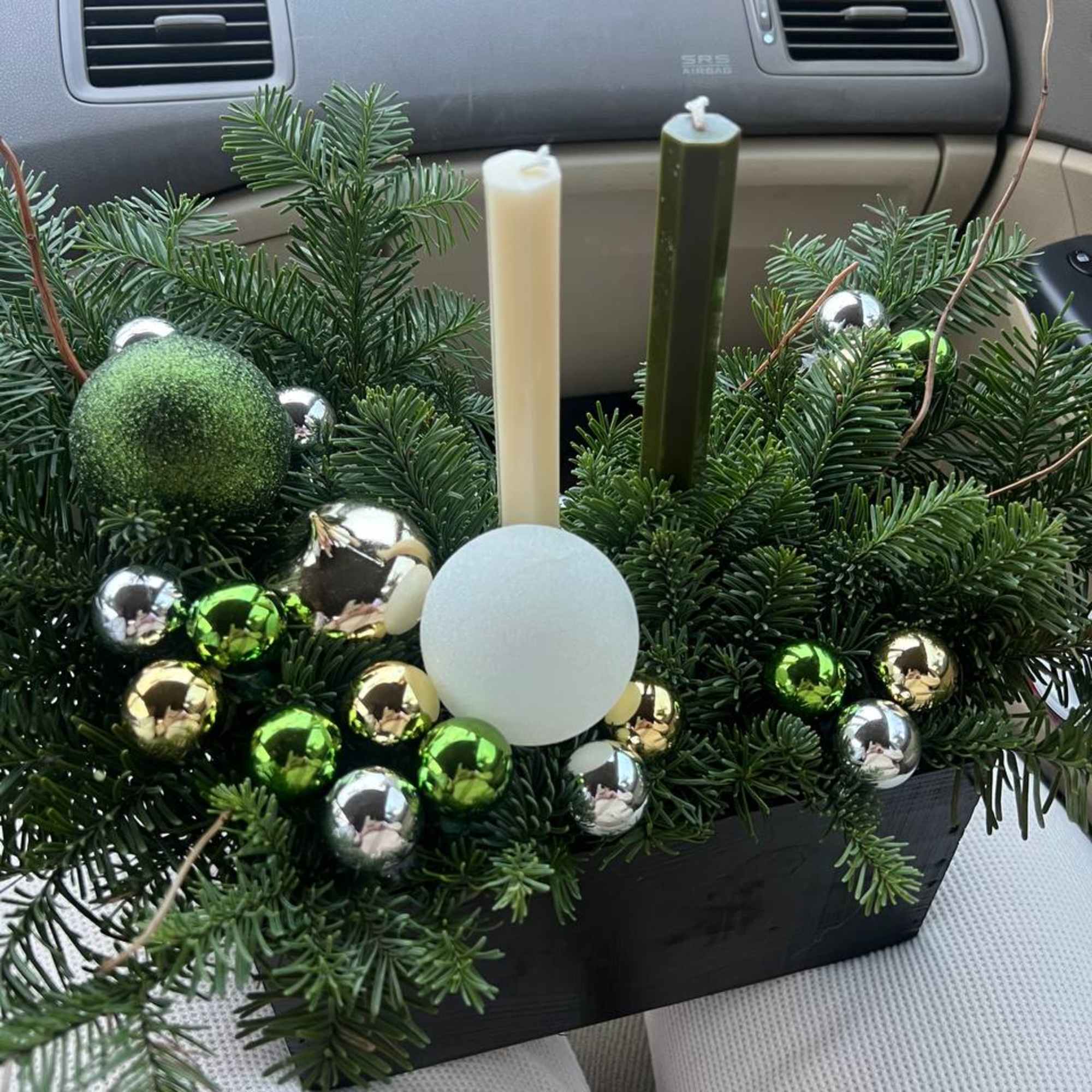 Christmas Glow is a festive arrangement filled with warmth and the magic Christmas Glow is a festive arrangement filled with warmth and the magic