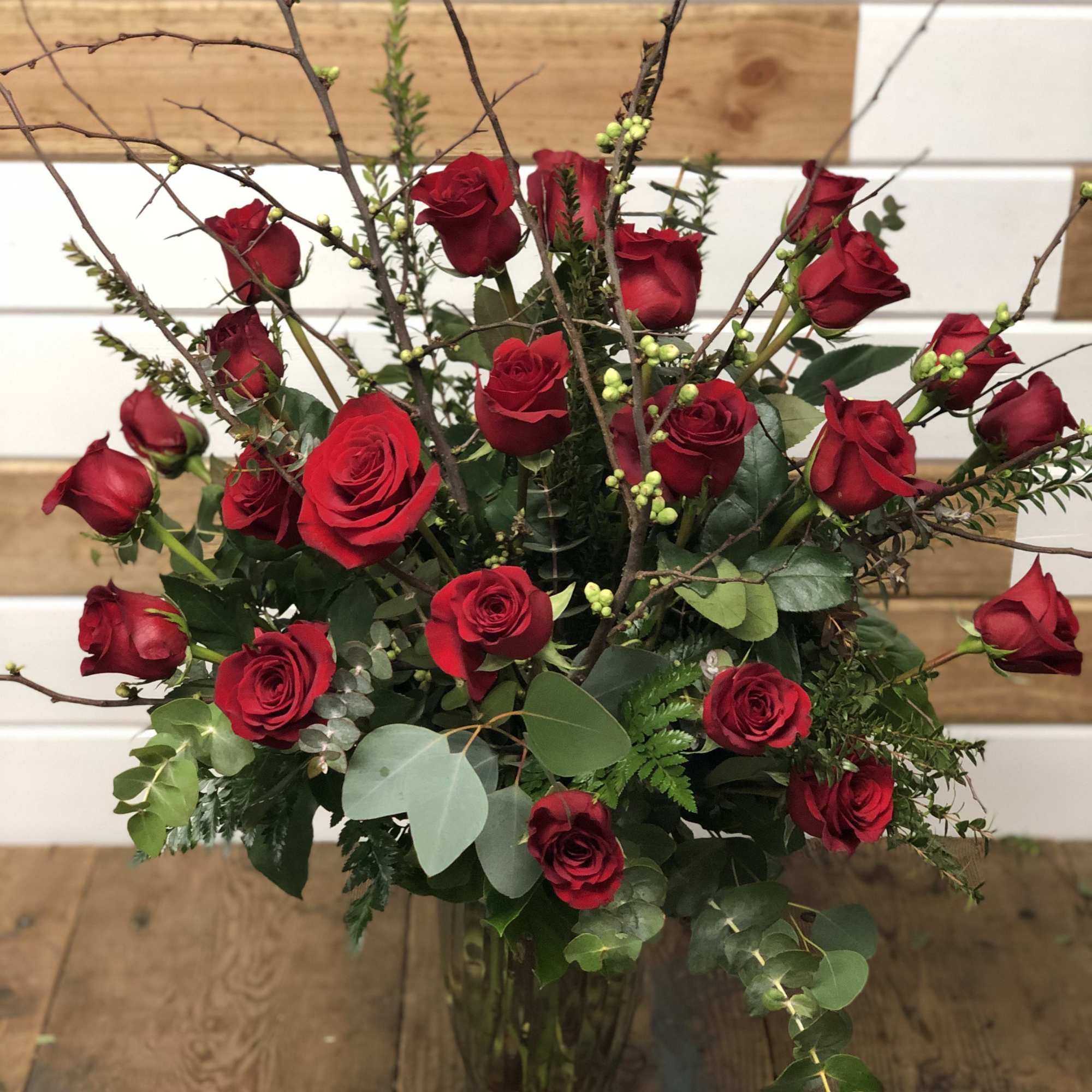 24 Fresh Long Stem Red Roses imported from South America in a 24 Fresh Long Stem Red Roses imported from South America in a